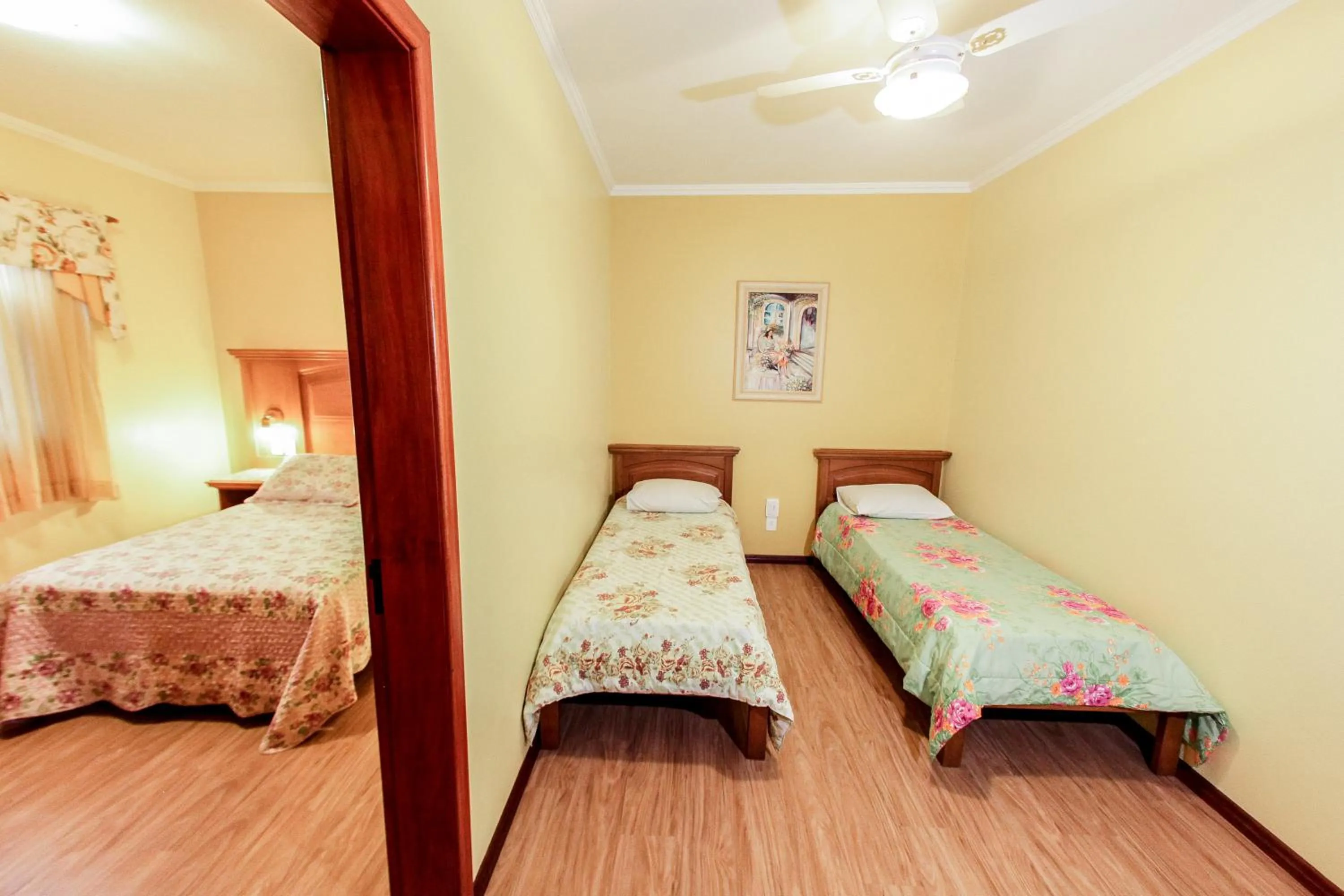 Bed in Pousada Das Papoulas