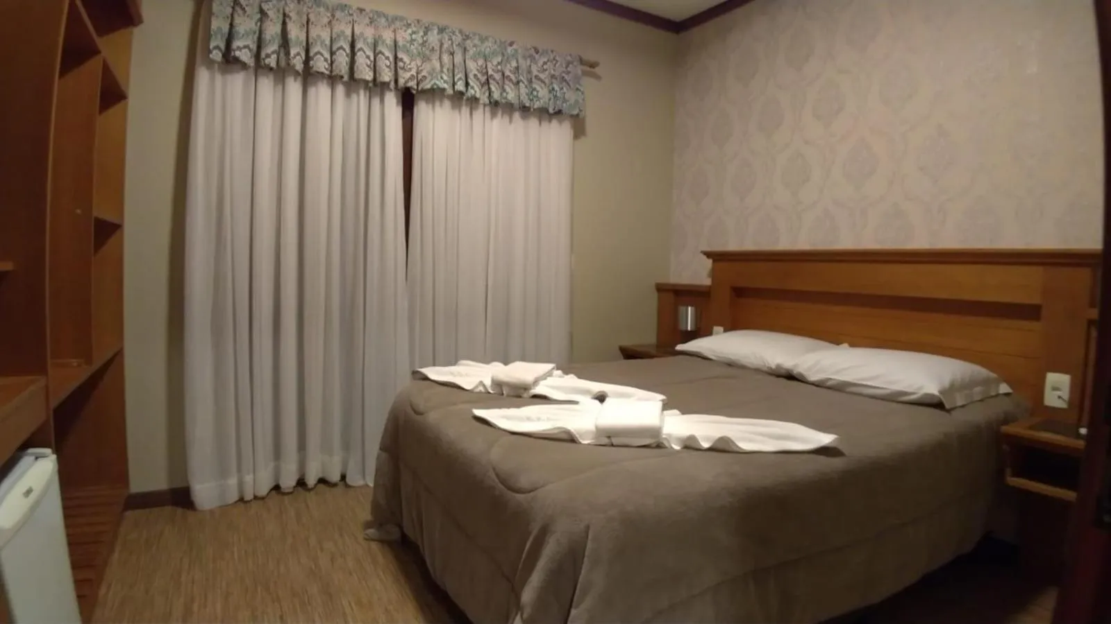 Bed in Pousada Das Papoulas