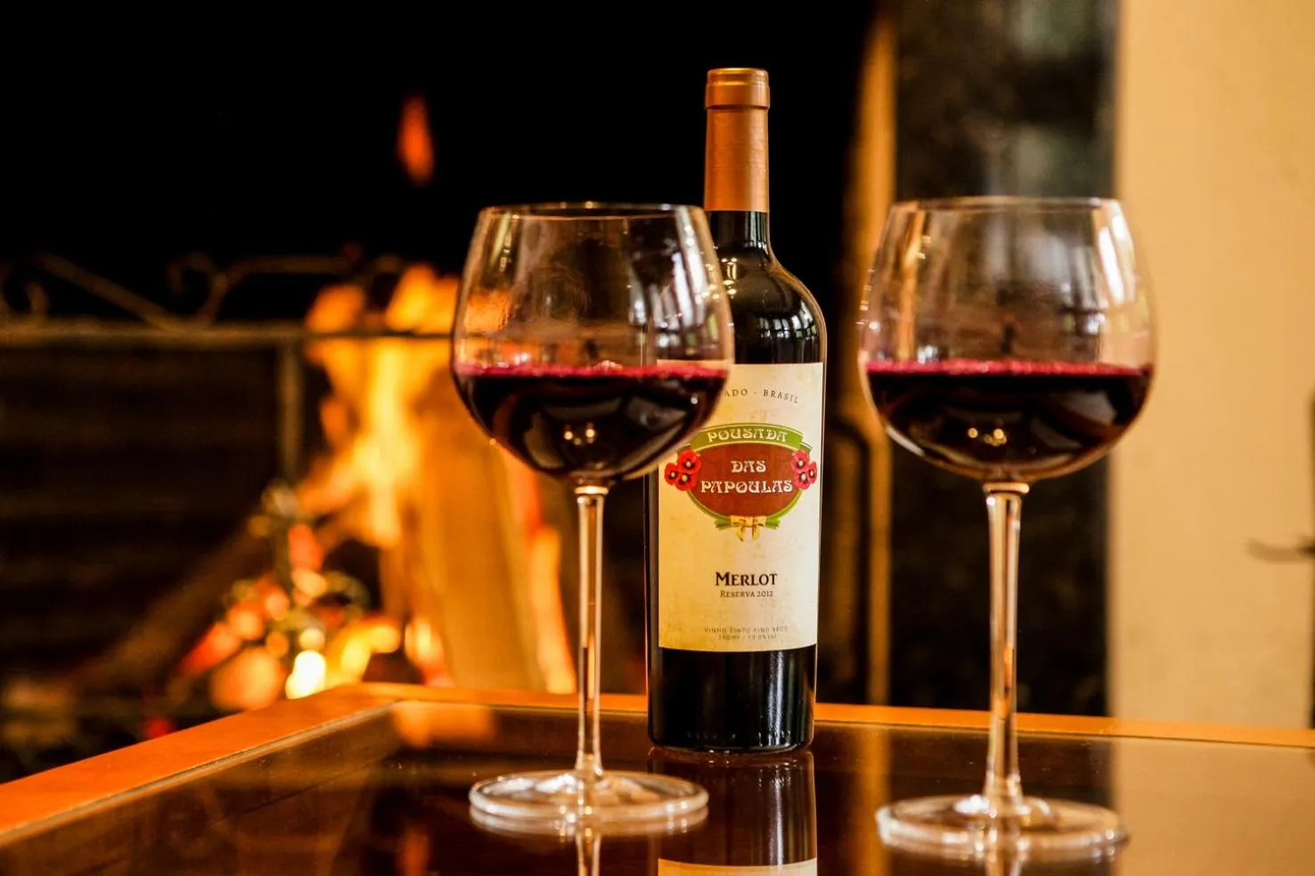 Communal lounge/ TV room in Pousada Das Papoulas