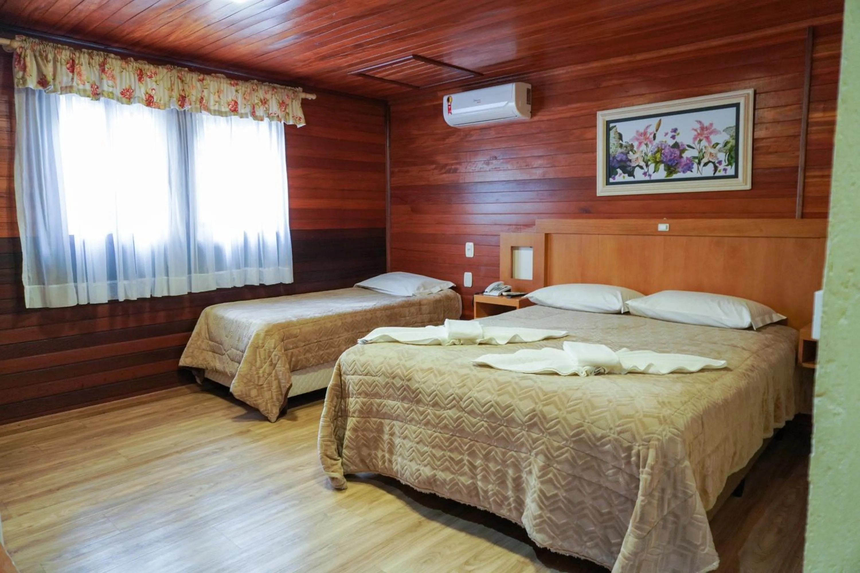 Bed in Pousada Das Papoulas