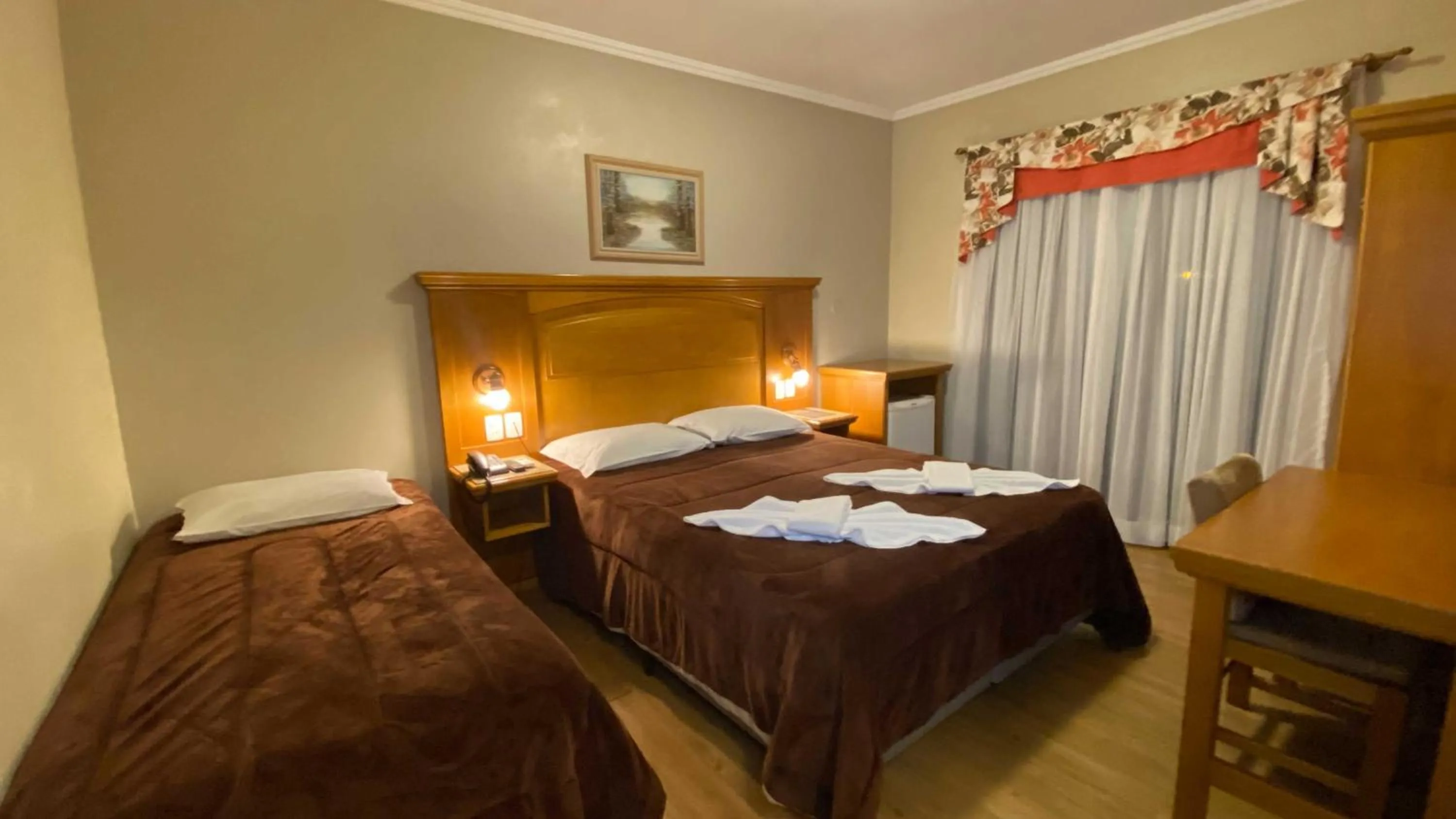 Photo of the whole room, Bed in Pousada Das Papoulas