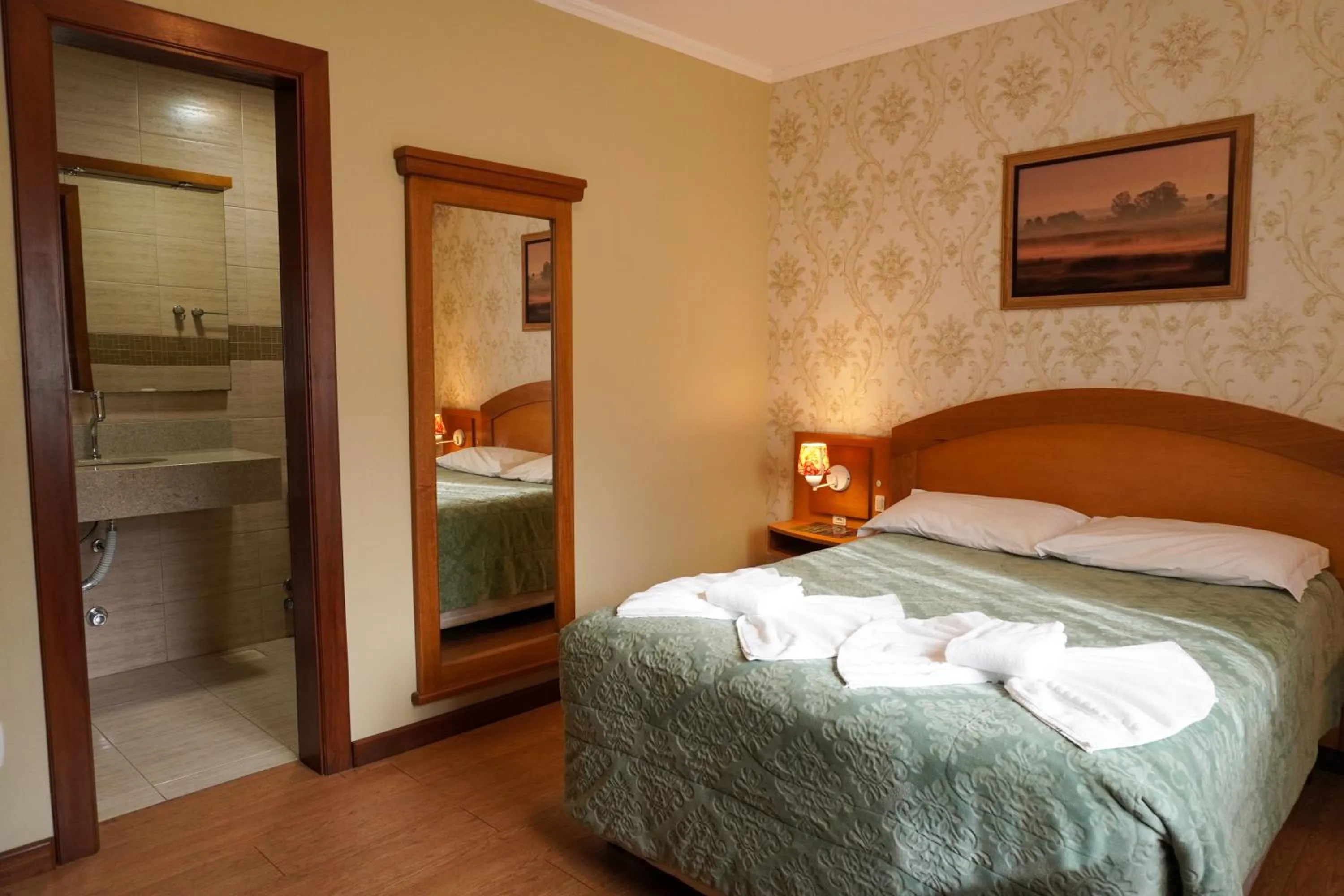 Bed in Pousada Das Papoulas