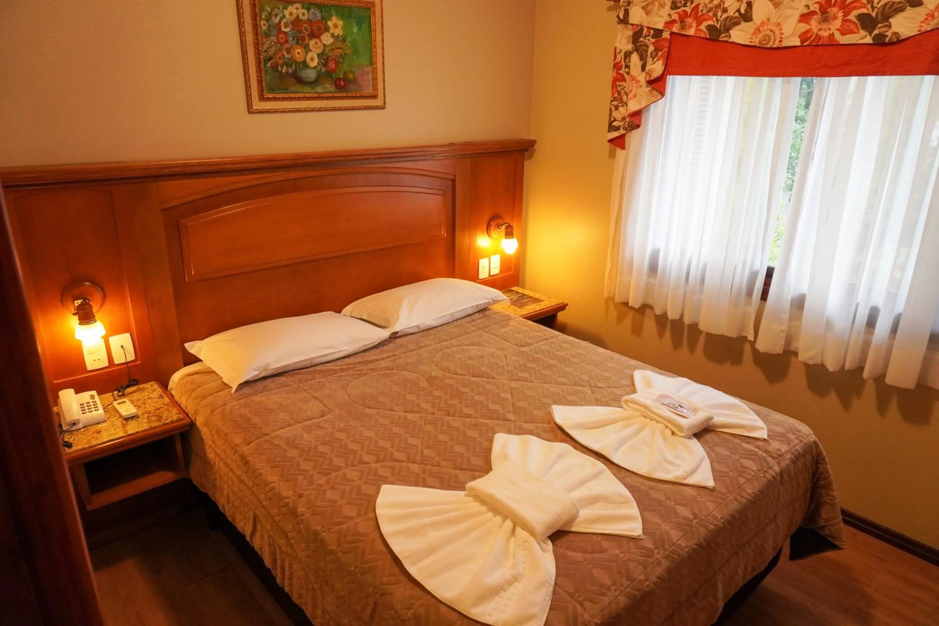 Bed in Pousada Das Papoulas