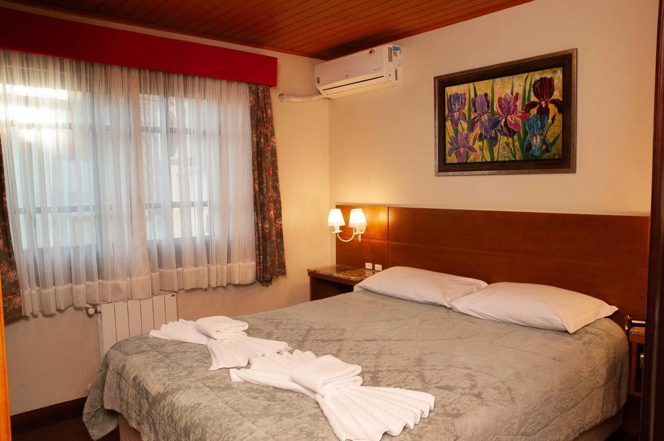 Bed in Pousada Das Papoulas