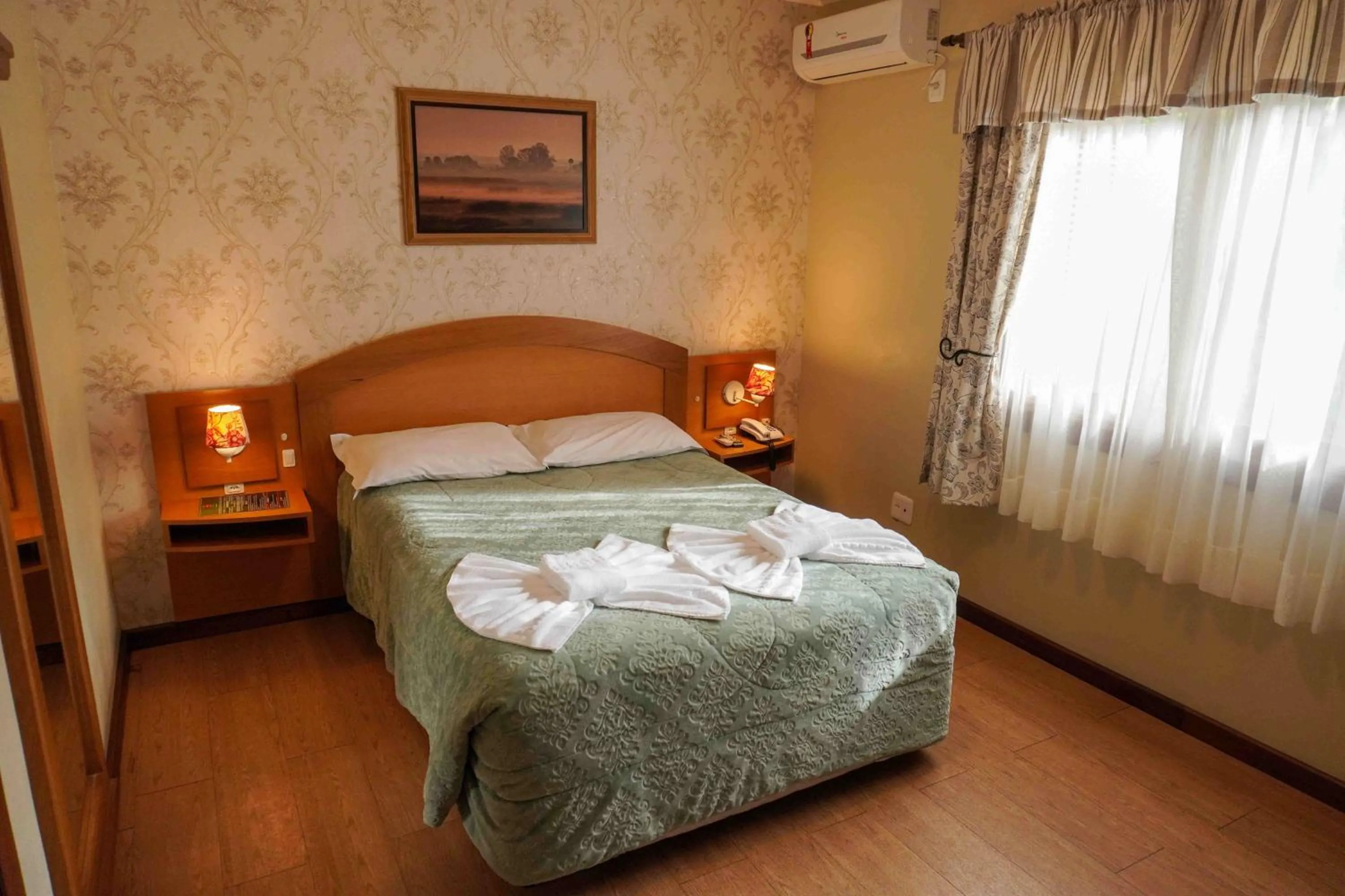 Bed in Pousada Das Papoulas