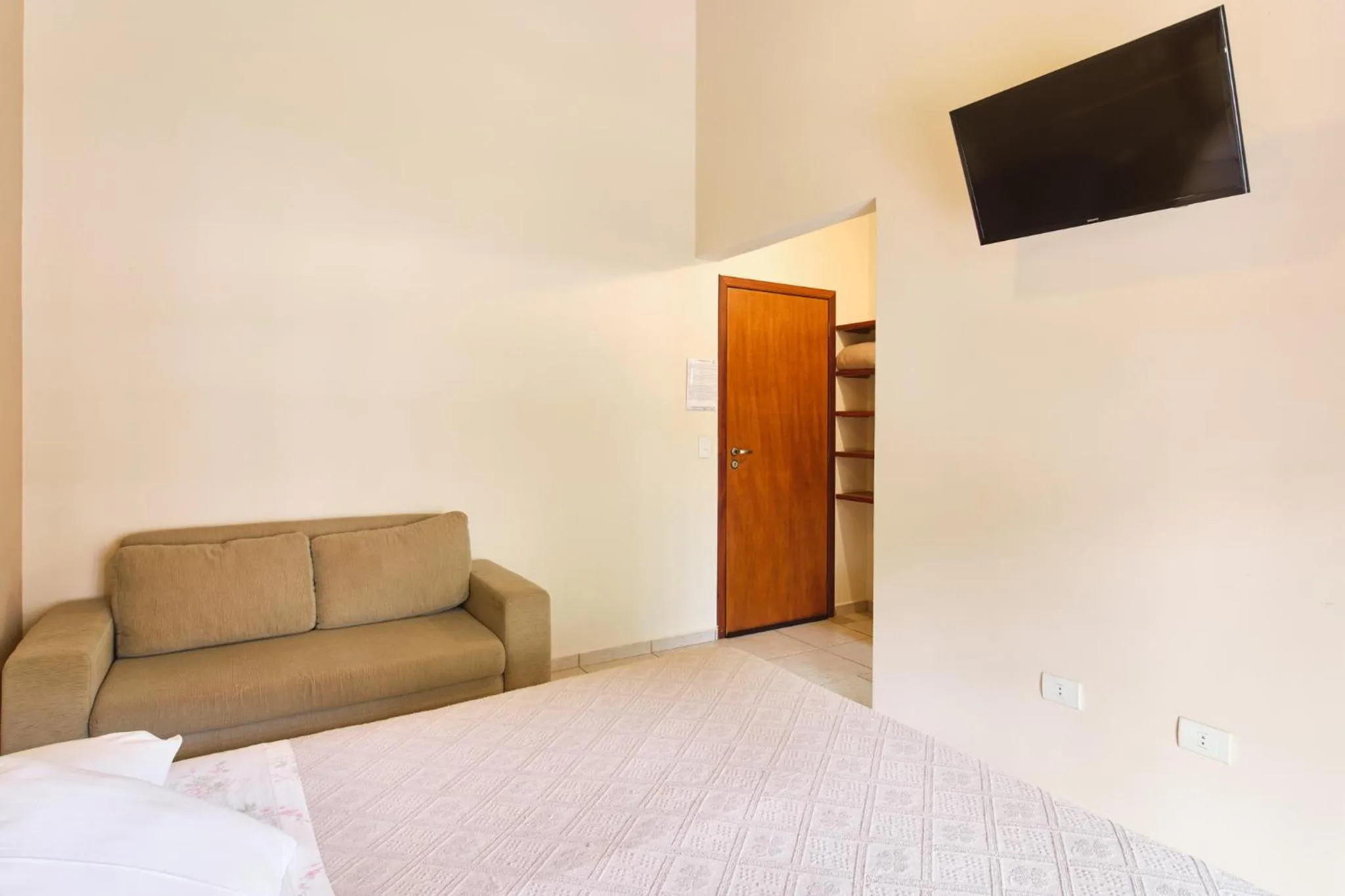 Bed in Pousada Recanto Montecarlo