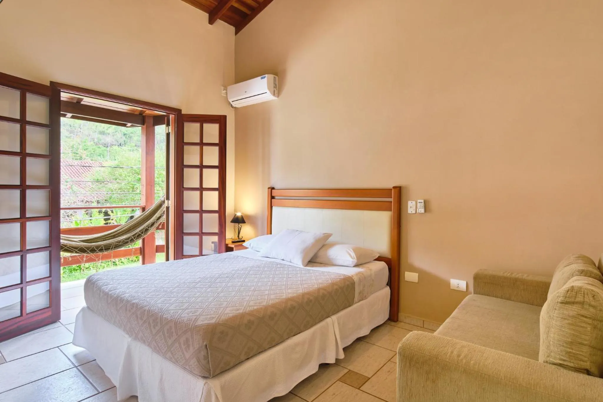 Bed in Pousada Recanto Montecarlo