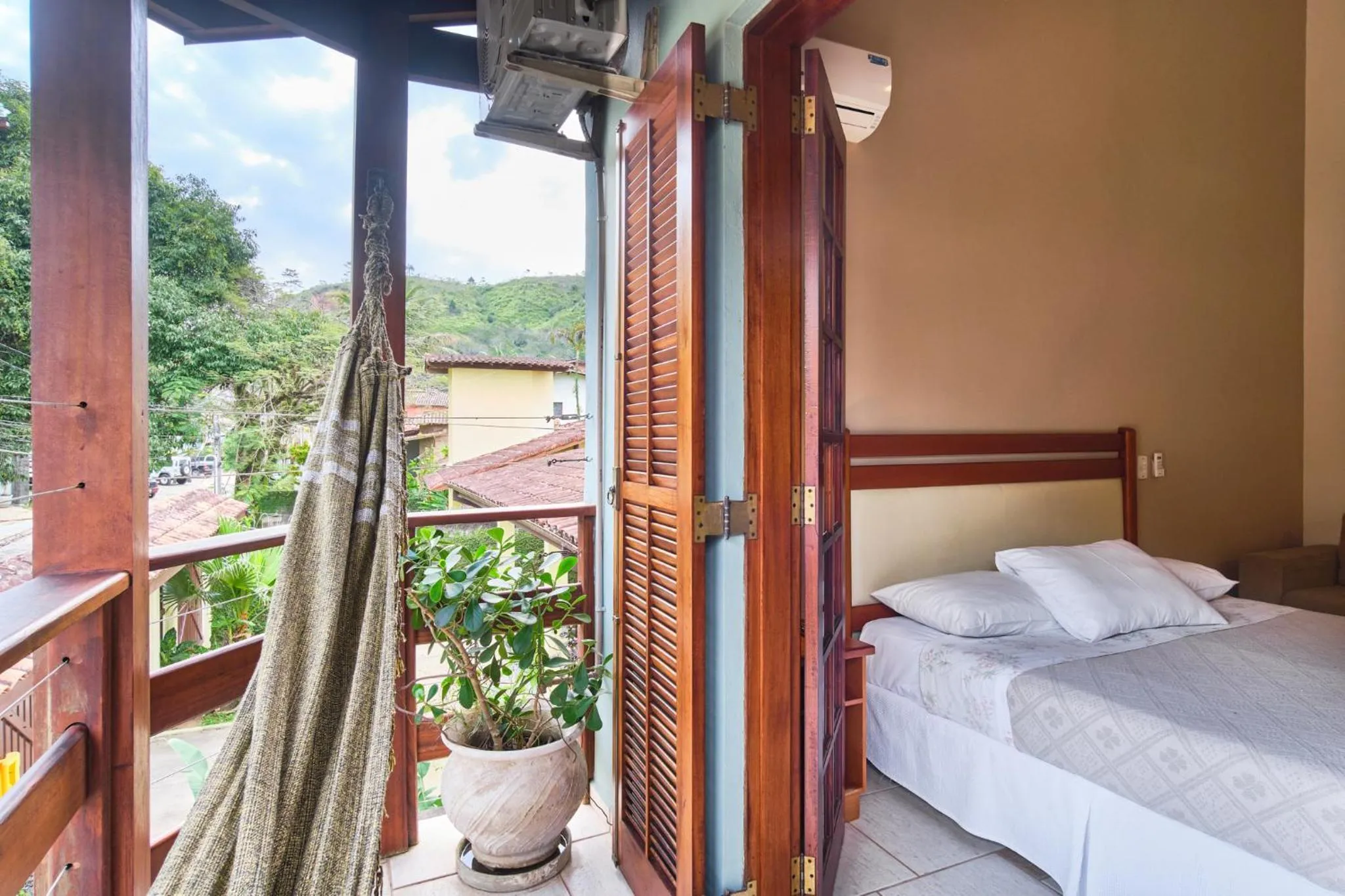 Bed in Pousada Recanto Montecarlo