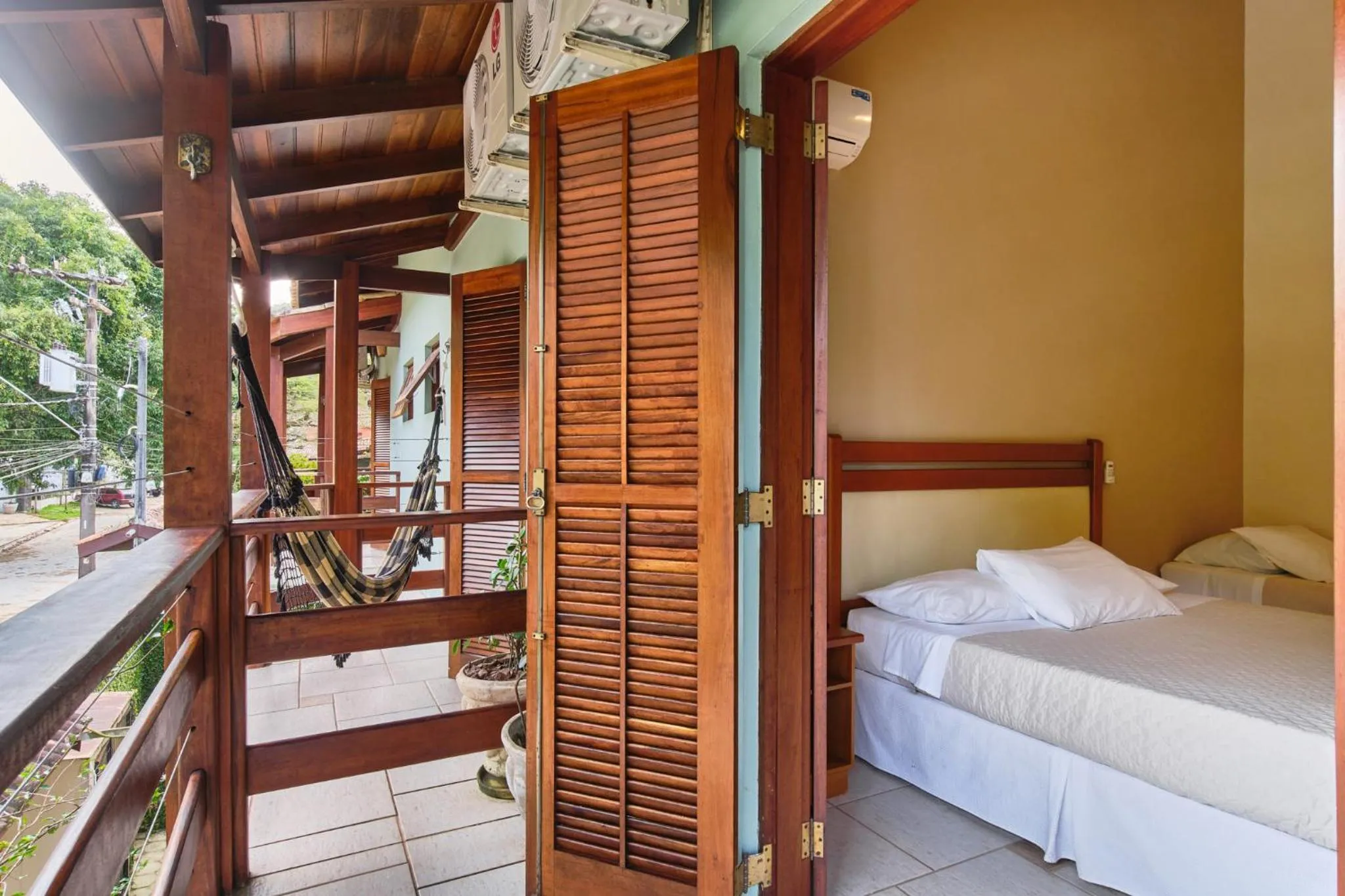 Bed in Pousada Recanto Montecarlo