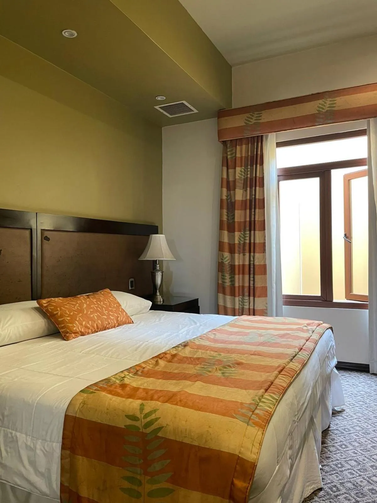 Bed in Hotel 1915 INN & SUITES