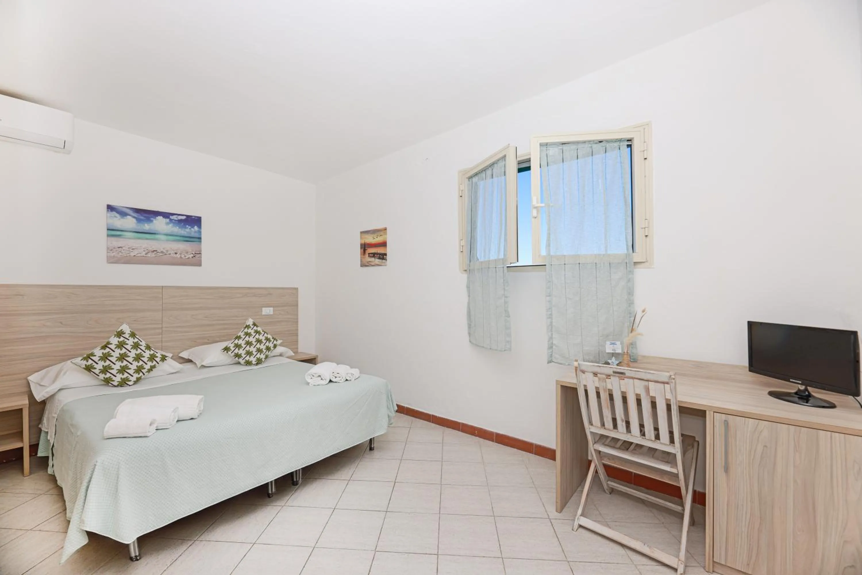 Bed in Hotel Le Ghiaie