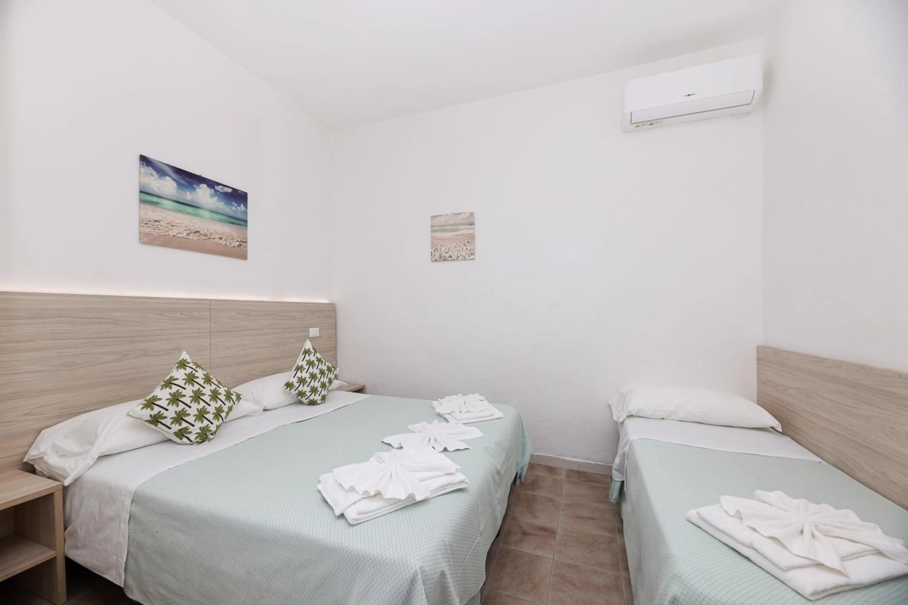 Bed in Hotel Le Ghiaie