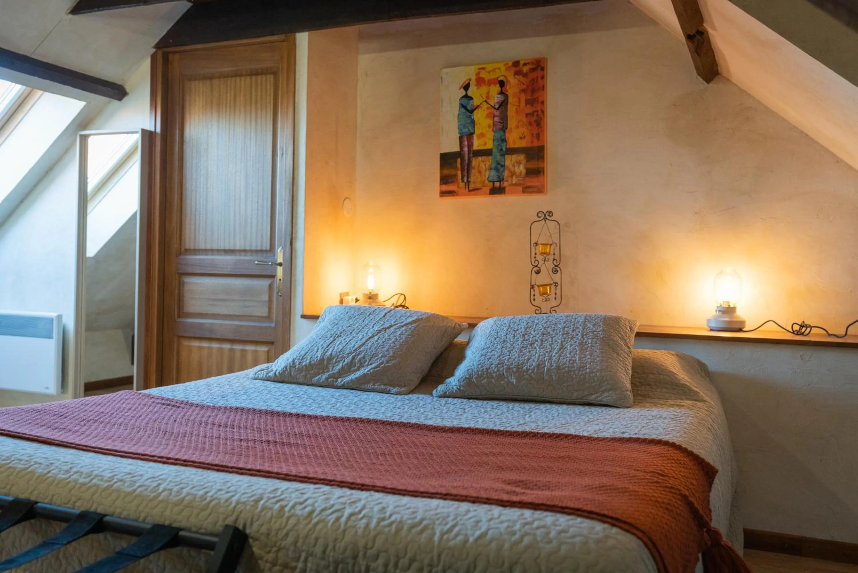 Bed in Chambres Du Marais