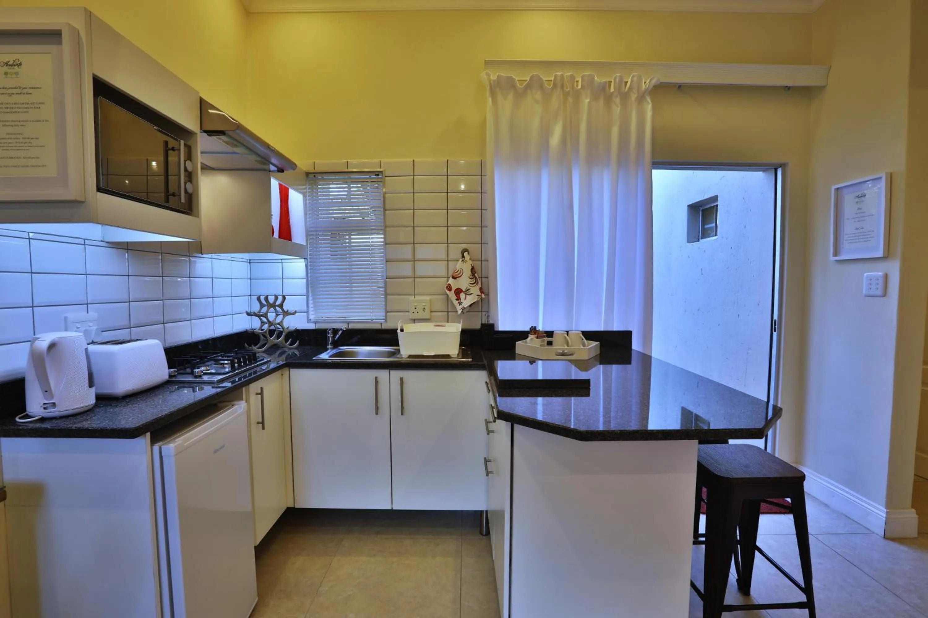 Kitchen or kitchenette in Andante Lodge