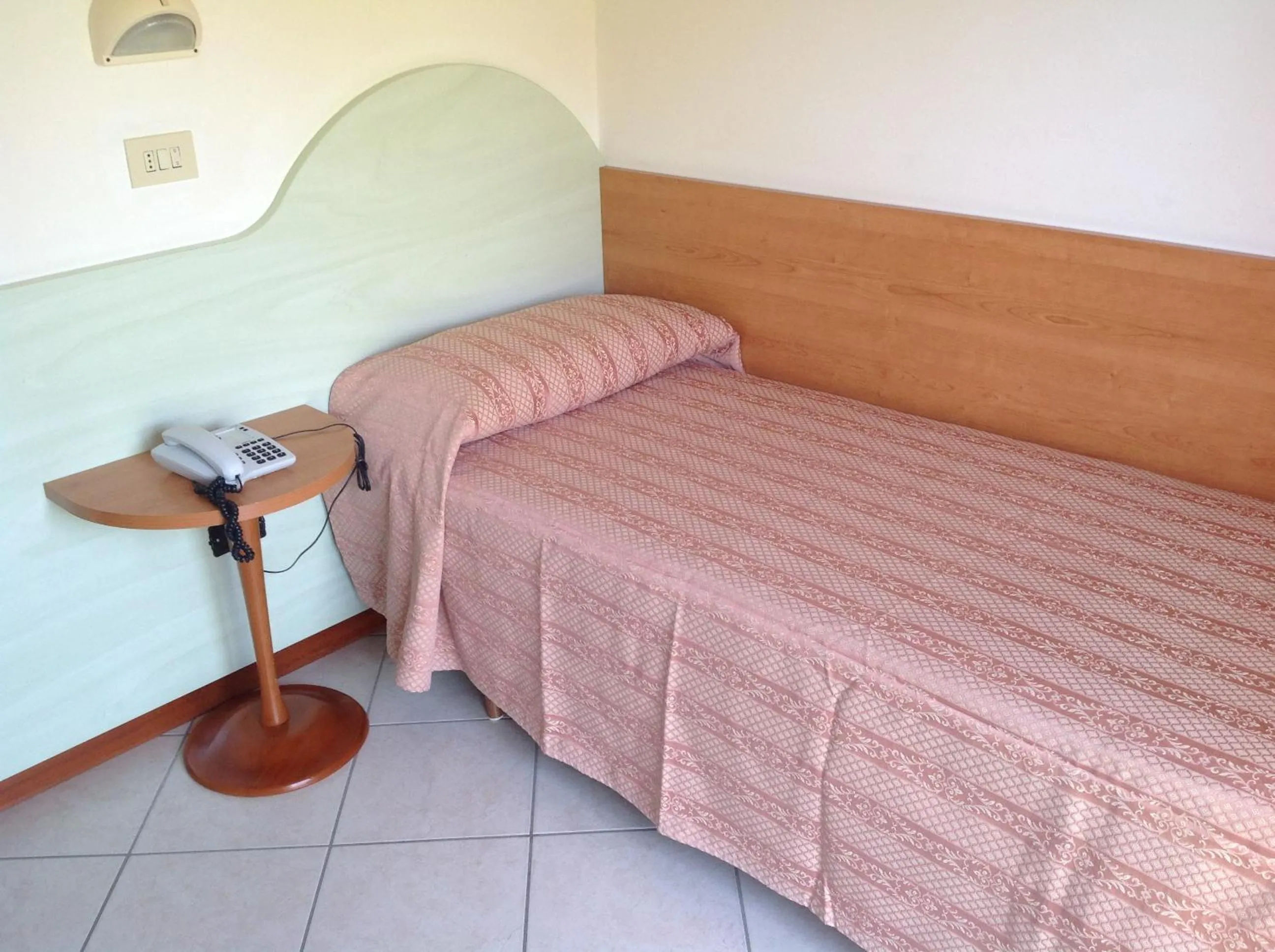 Bed in Hotel Parini