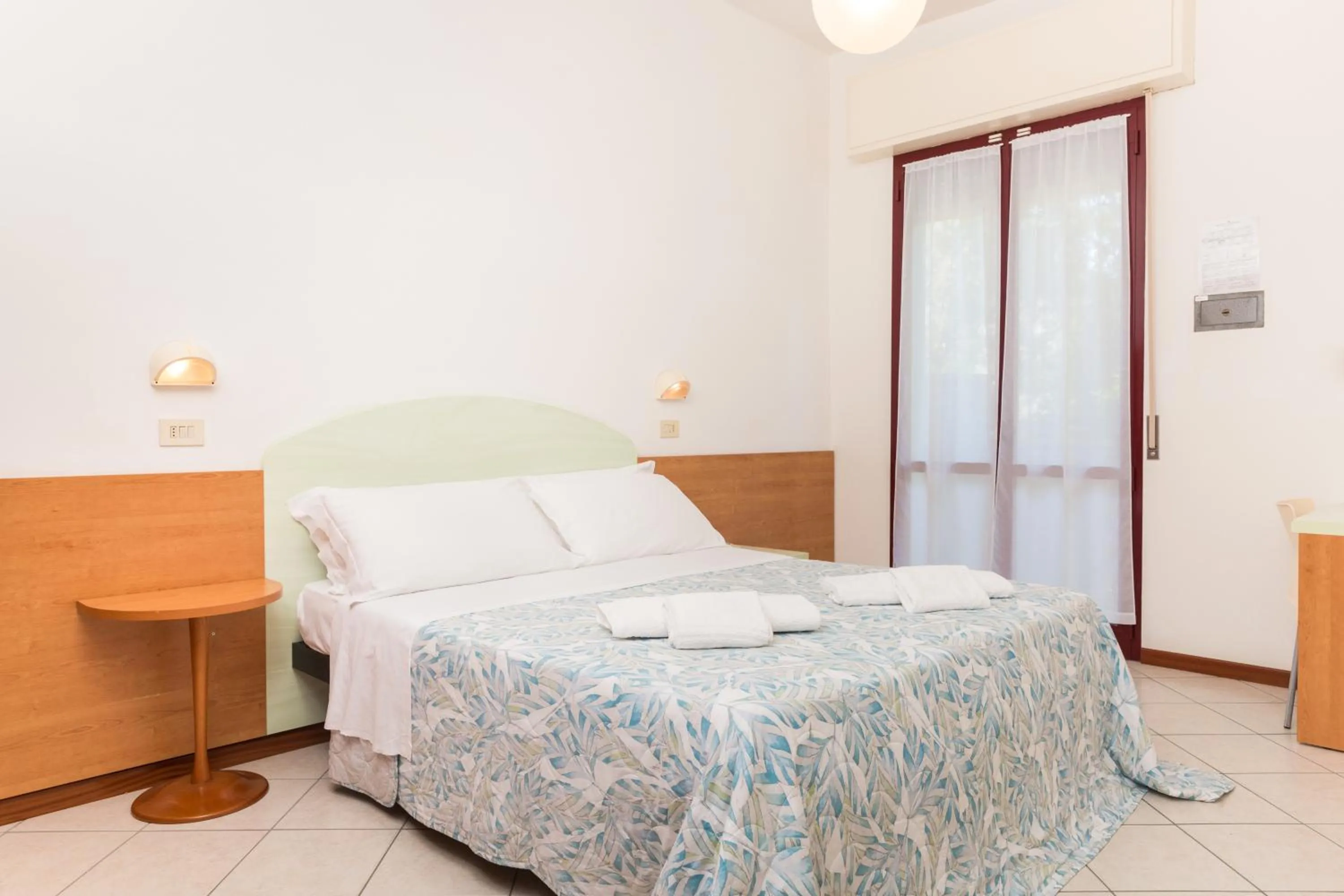 Bedroom in Hotel Parini