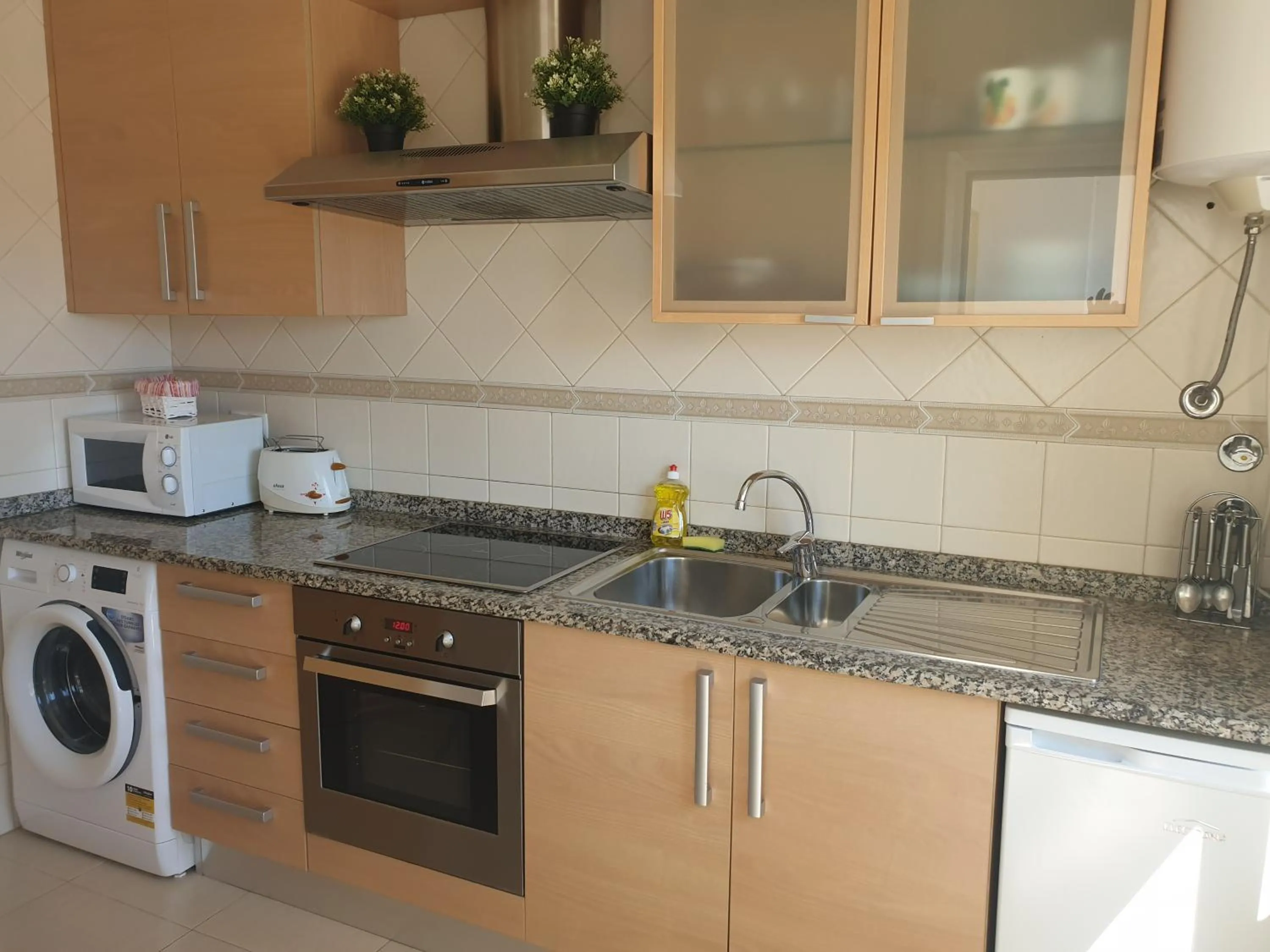 Kitchen or kitchenette in Albufeira Falesia Beach Apartment
