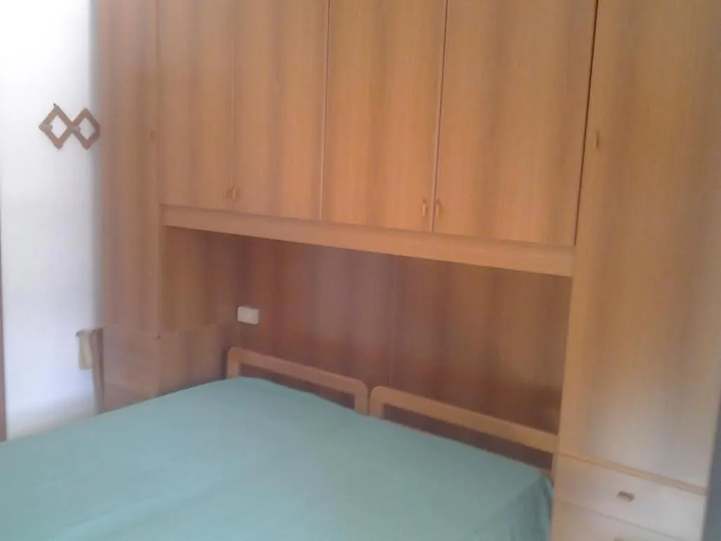 Bed in Hotel Rustichello