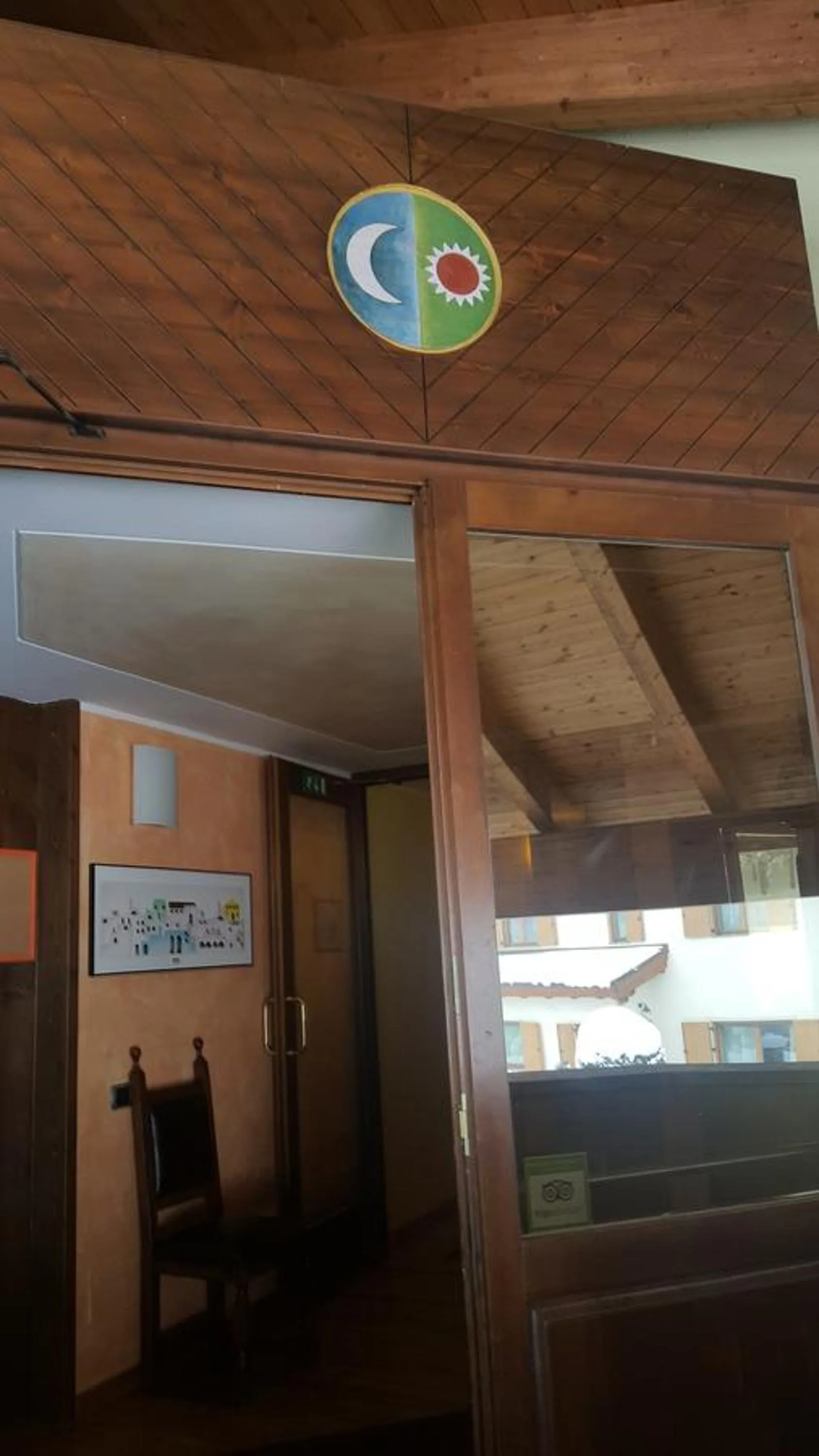 Property logo or sign in La Baita D'Oro Ristorante Residence