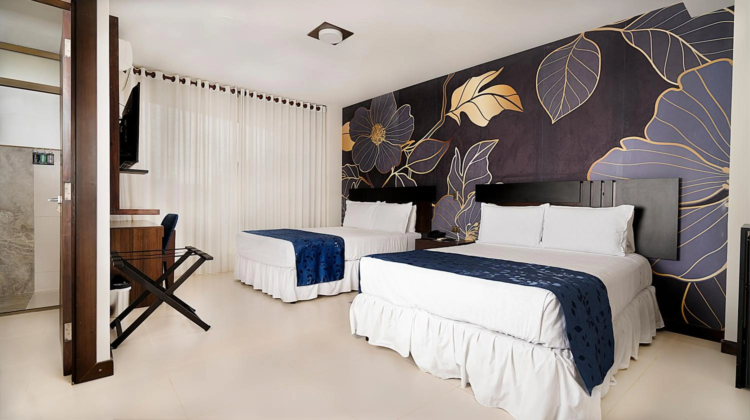 Bed in Mai Suites Apart Hotel