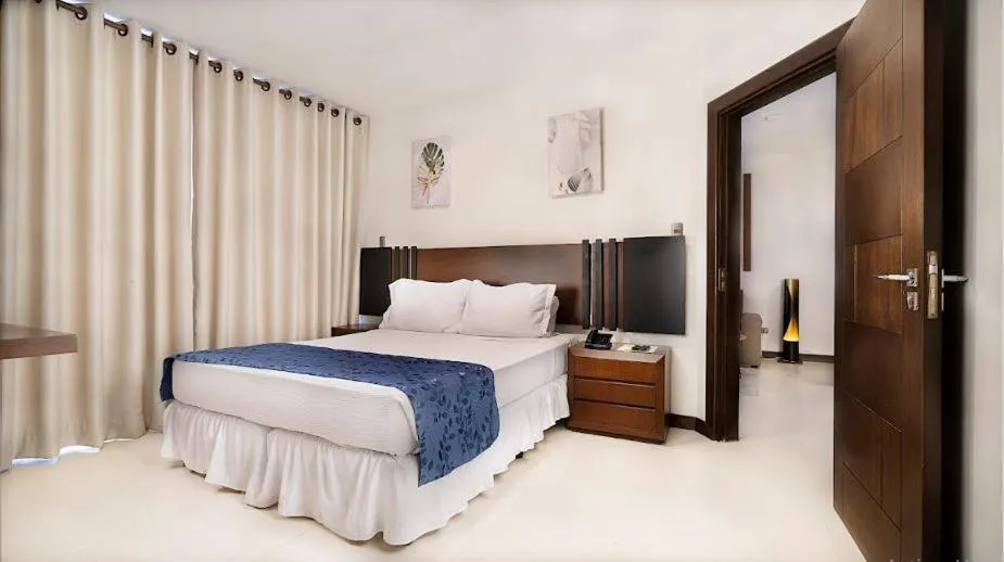 Bed in Mai Suites Apart Hotel