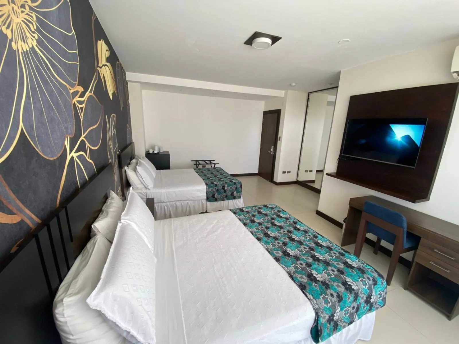 Bed in Mai Suites Apart Hotel