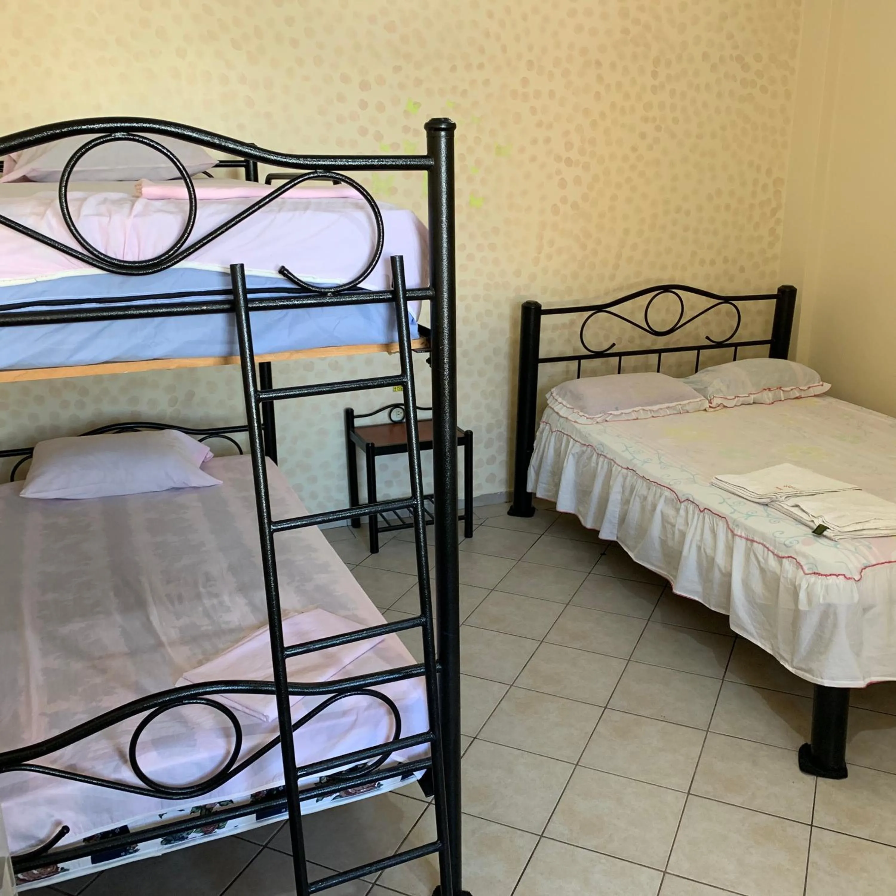 Bed in HOTEL SUNSHINE AIRE ACND y WIFI ZONE