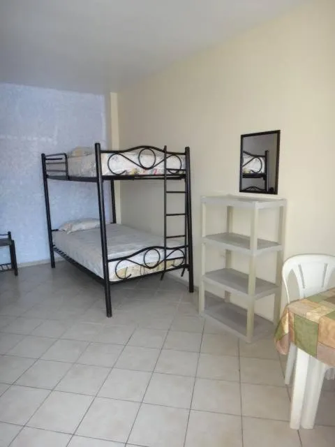 Bed in HOTEL SUNSHINE AIRE ACND y WIFI ZONE