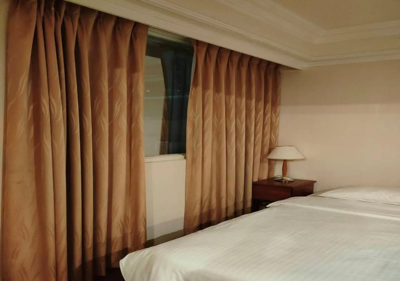 Bed in Champion Hotel