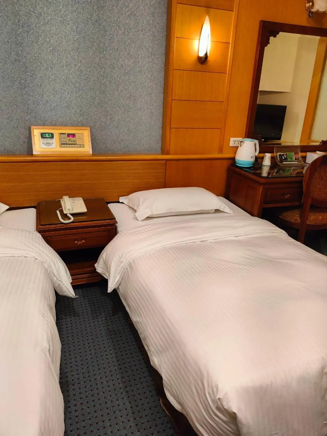 Bed in Champion Hotel