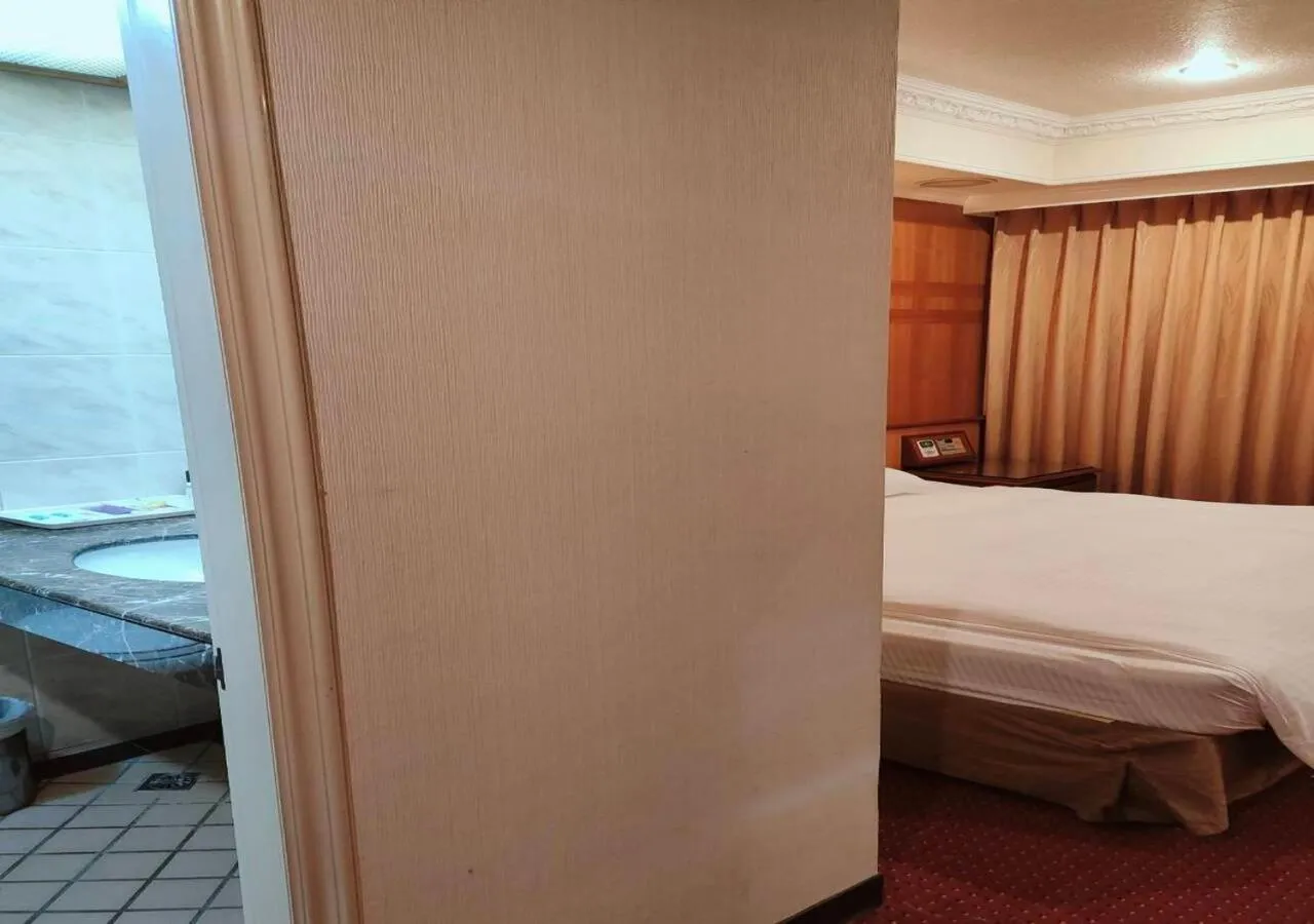 Bed in Champion Hotel