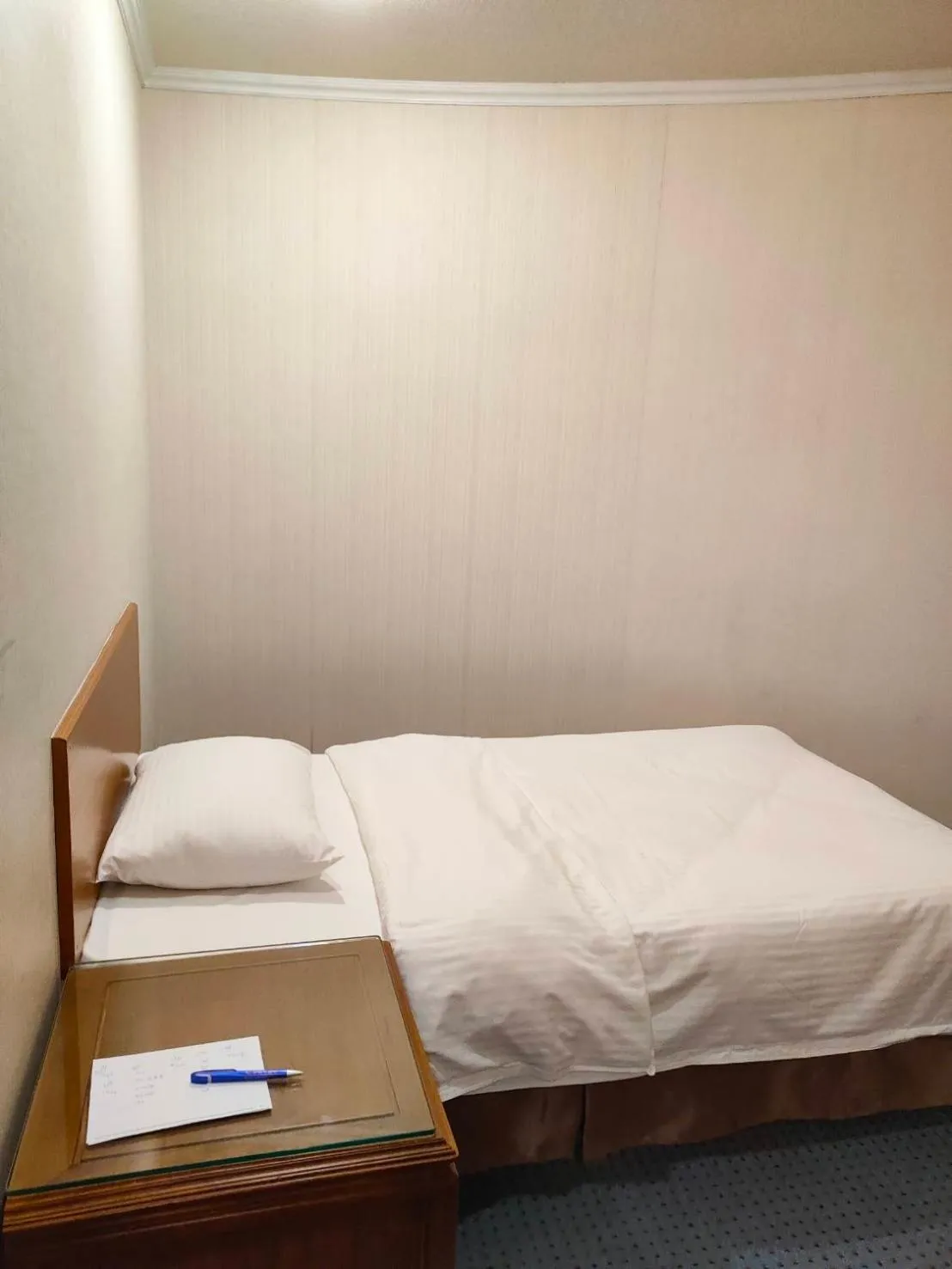 Bed in Champion Hotel