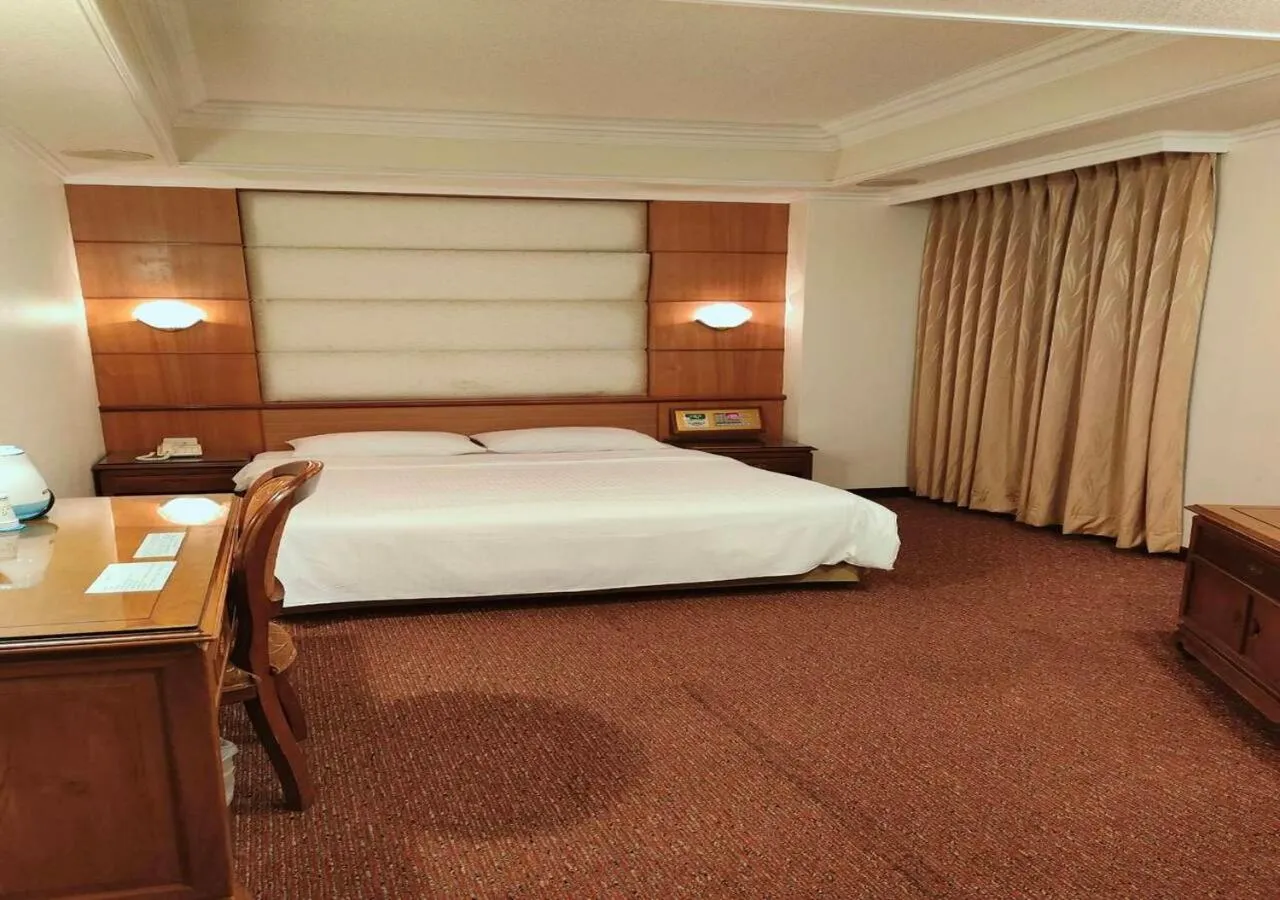 Bed in Champion Hotel