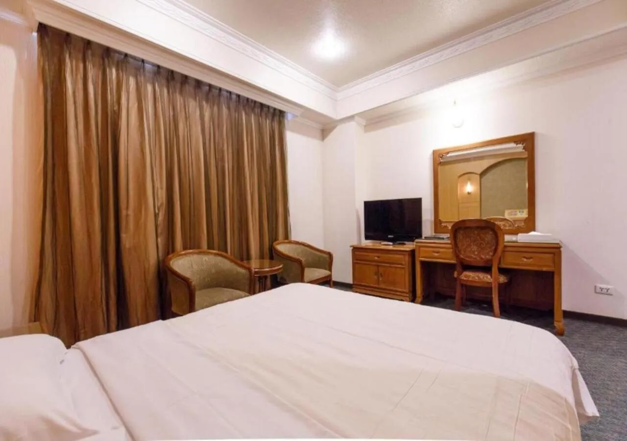 Bed in Champion Hotel