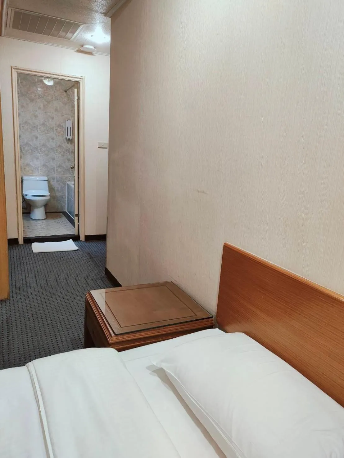 Bed in Champion Hotel