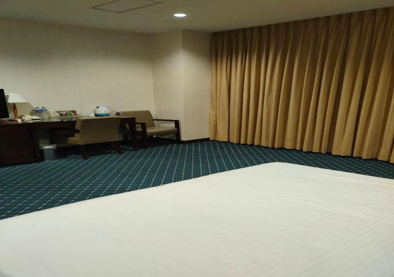 Bed in Champion Hotel