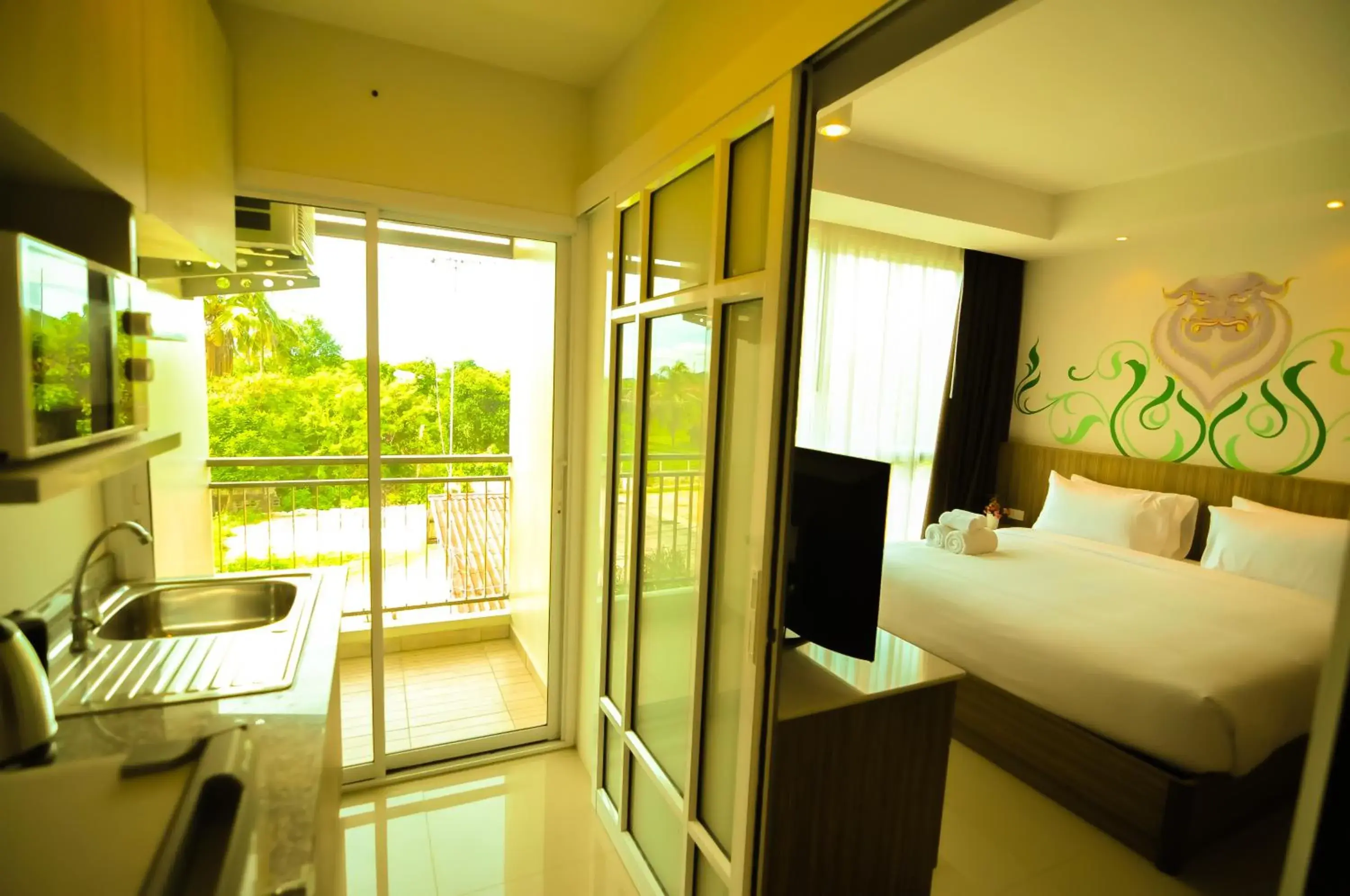 Kitchen or kitchenette, Bed in The Sila Hotel Kitchen or kitchenette, Bed in The Sila Hotel