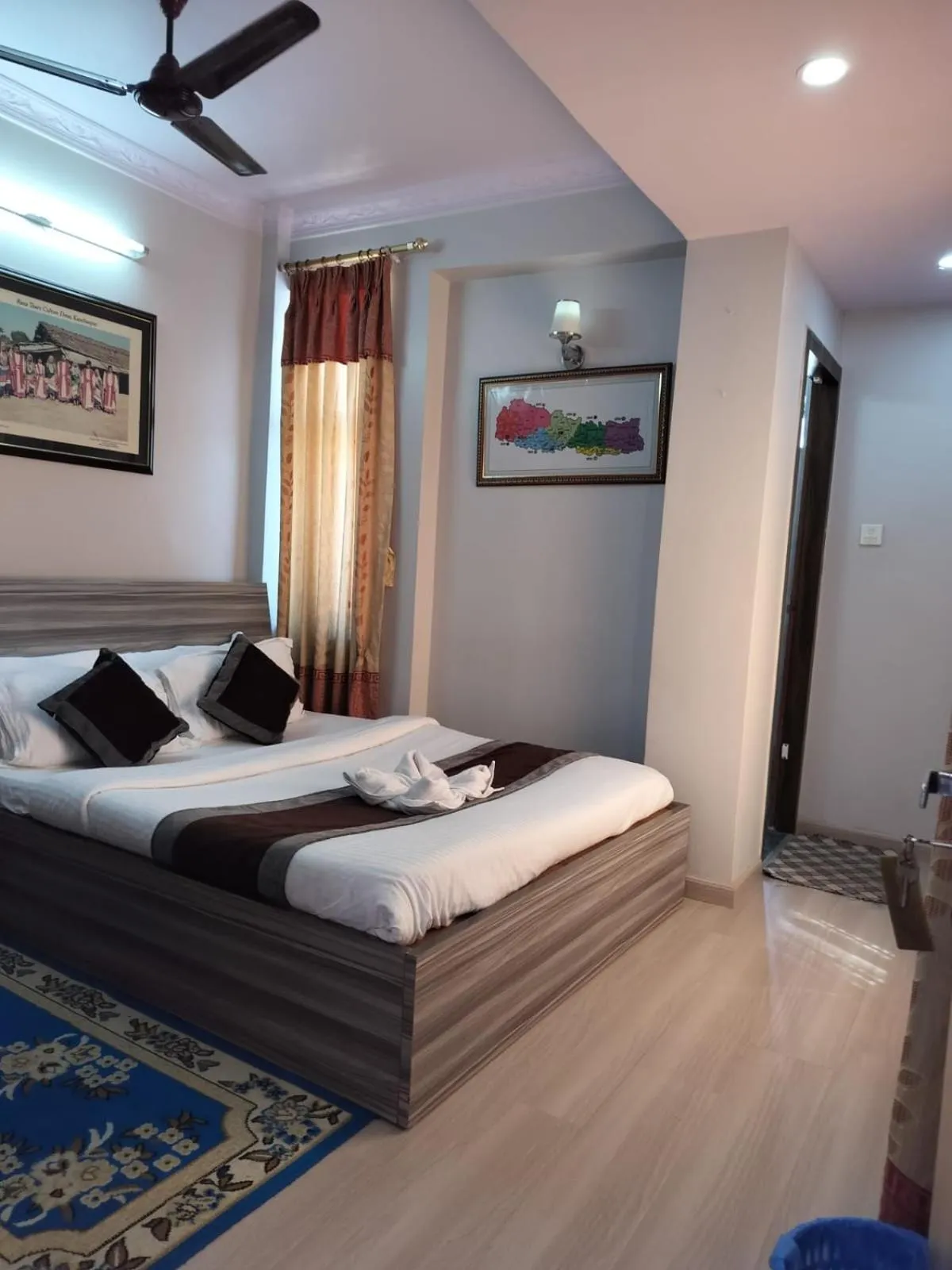 Bed in Three Brothers Apartment and Hotel