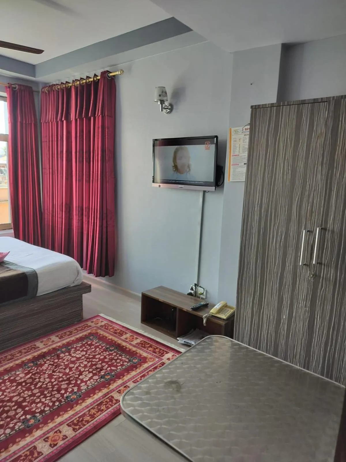 Bed in Three Brothers Apartment and Hotel