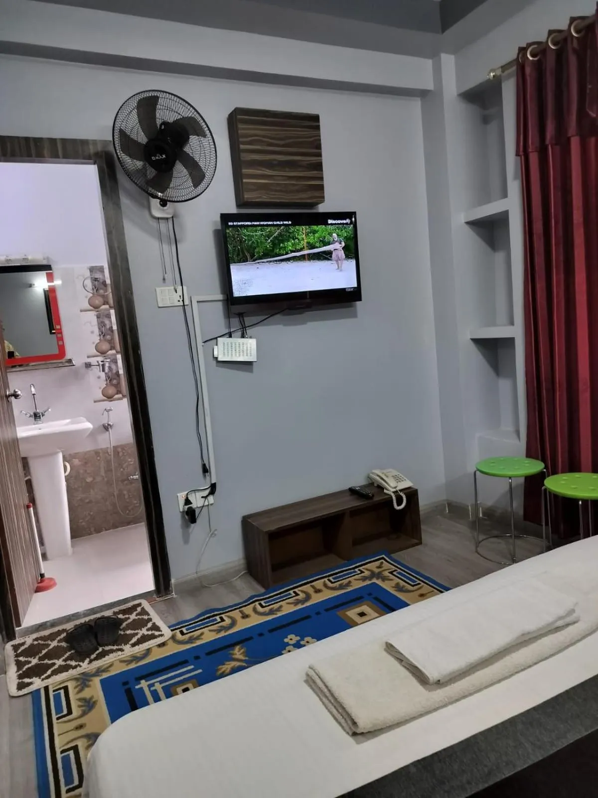 Bed in Three Brothers Apartment and Hotel