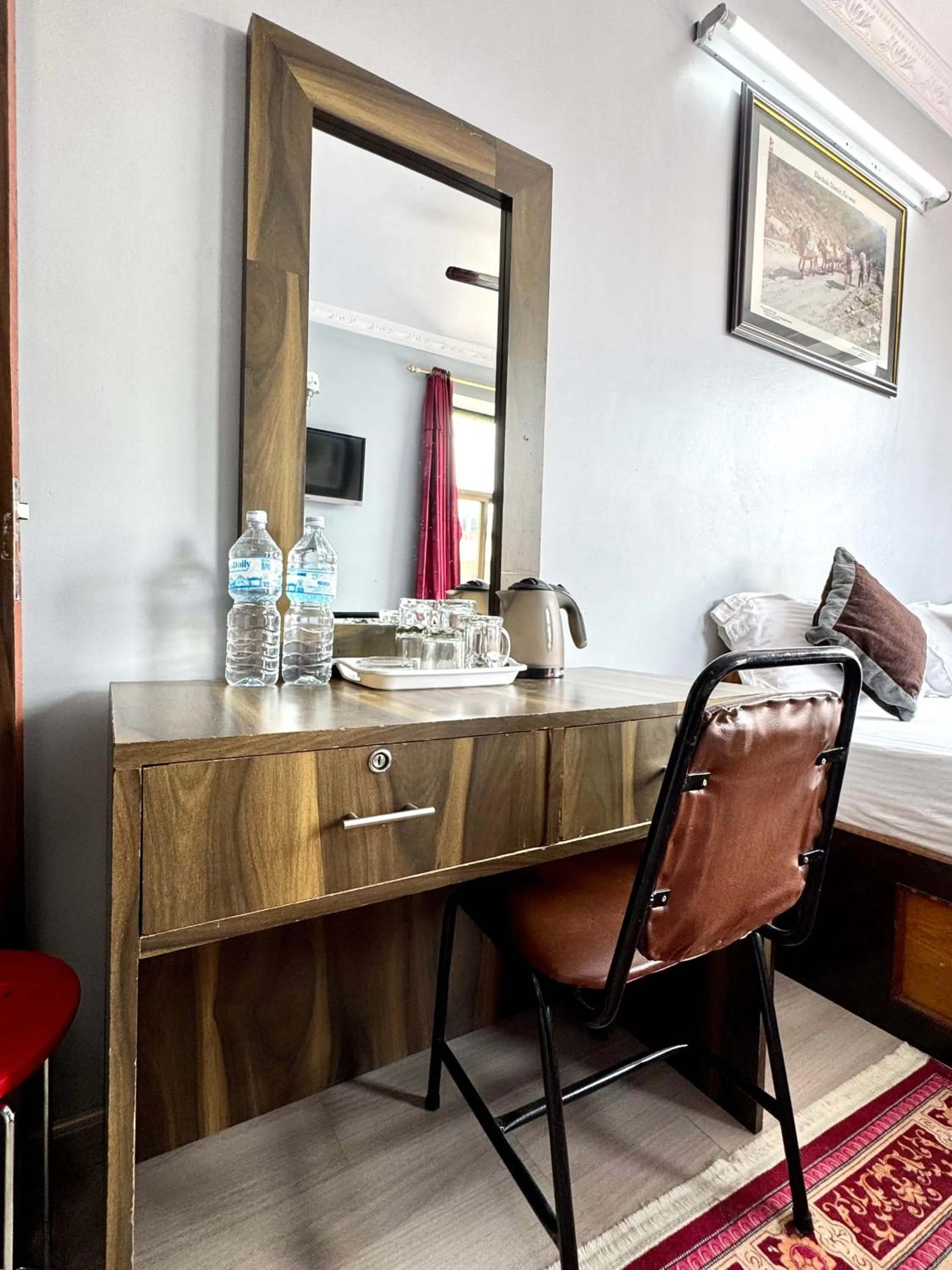 Bed in Three Brothers Apartment and Hotel