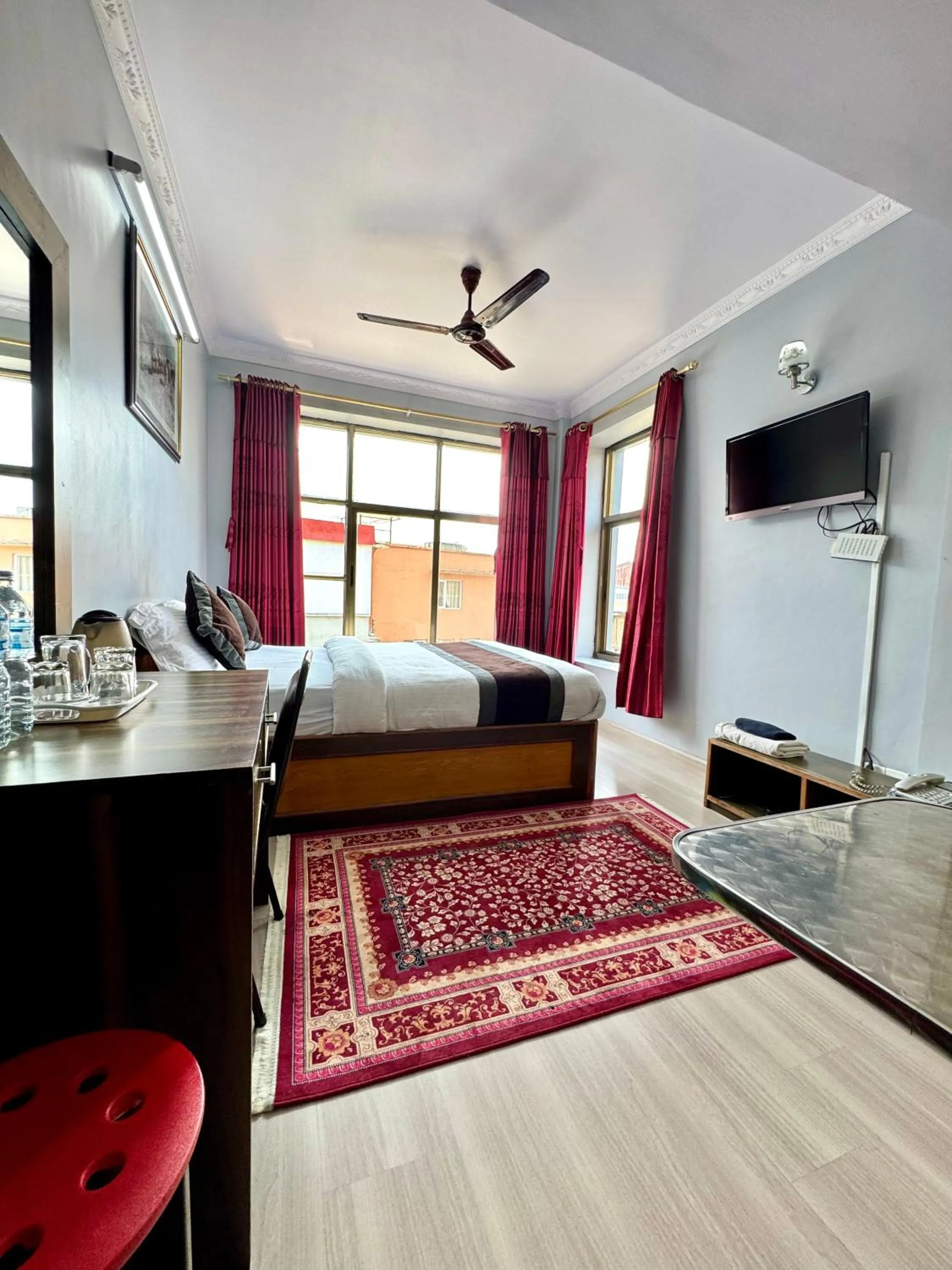 Bed in Three Brothers Apartment and Hotel