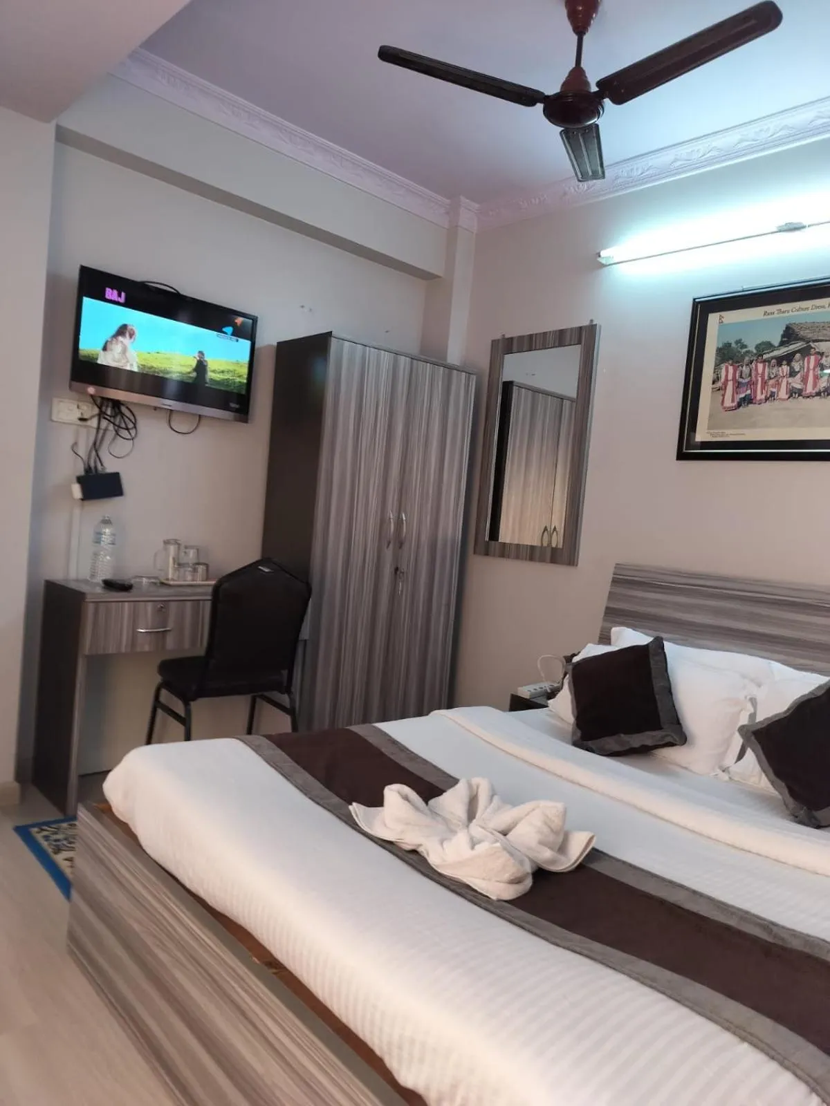 Bed in Three Brothers Apartment and Hotel