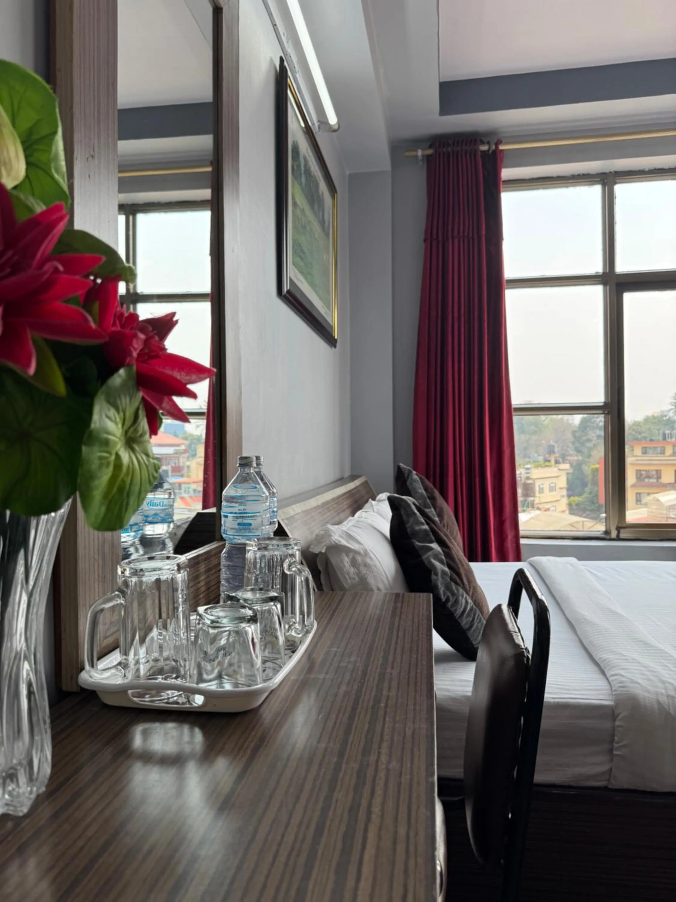 Bed in Three Brothers Apartment and Hotel