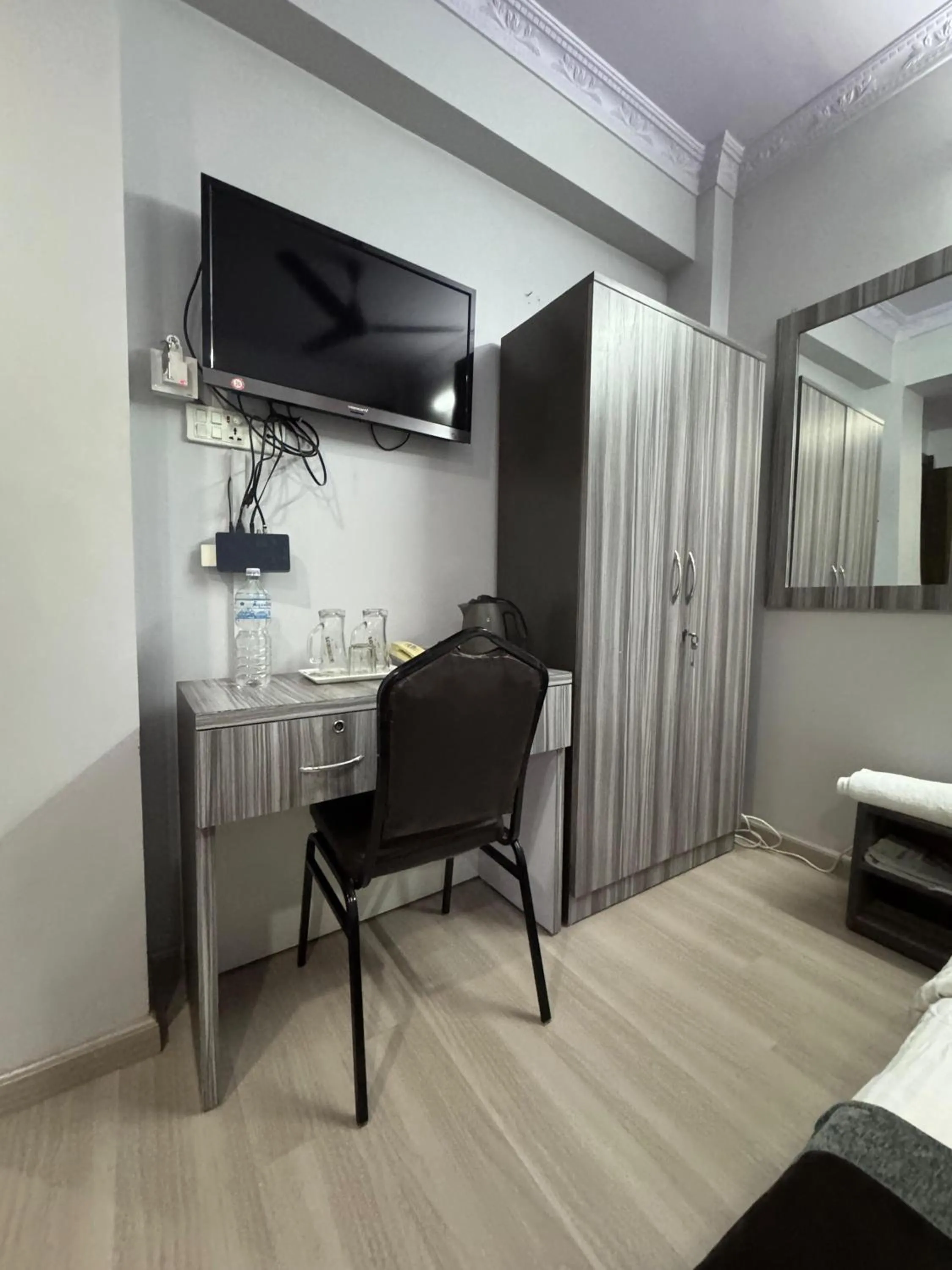 Bed in Three Brothers Apartment and Hotel