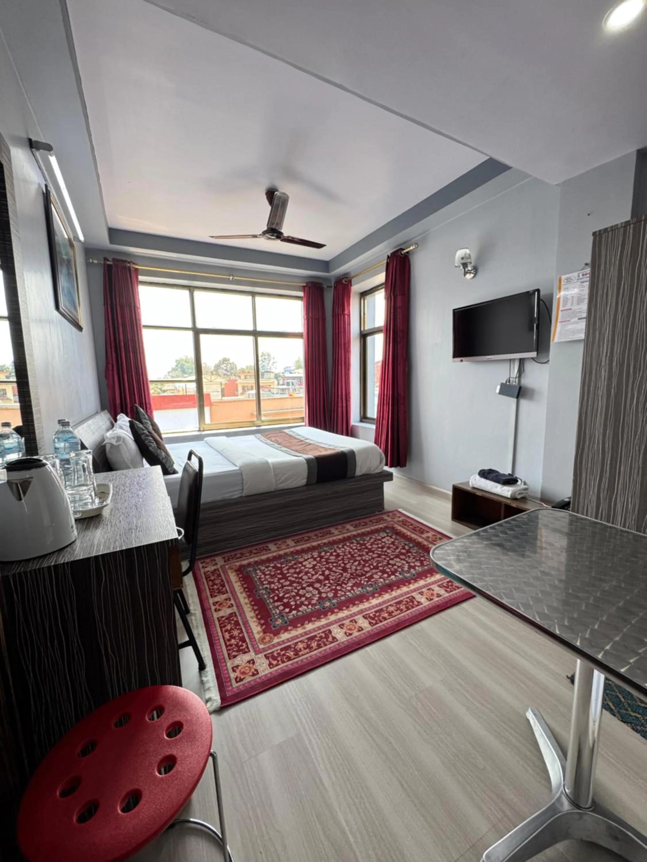 Bed in Three Brothers Apartment and Hotel