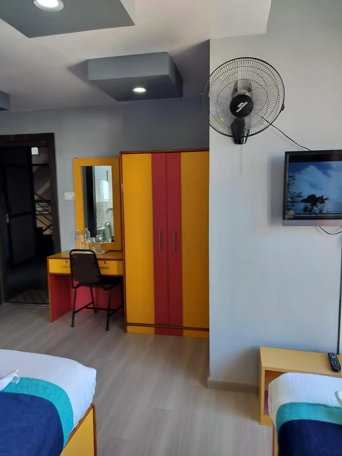 Bed in Three Brothers Apartment and Hotel