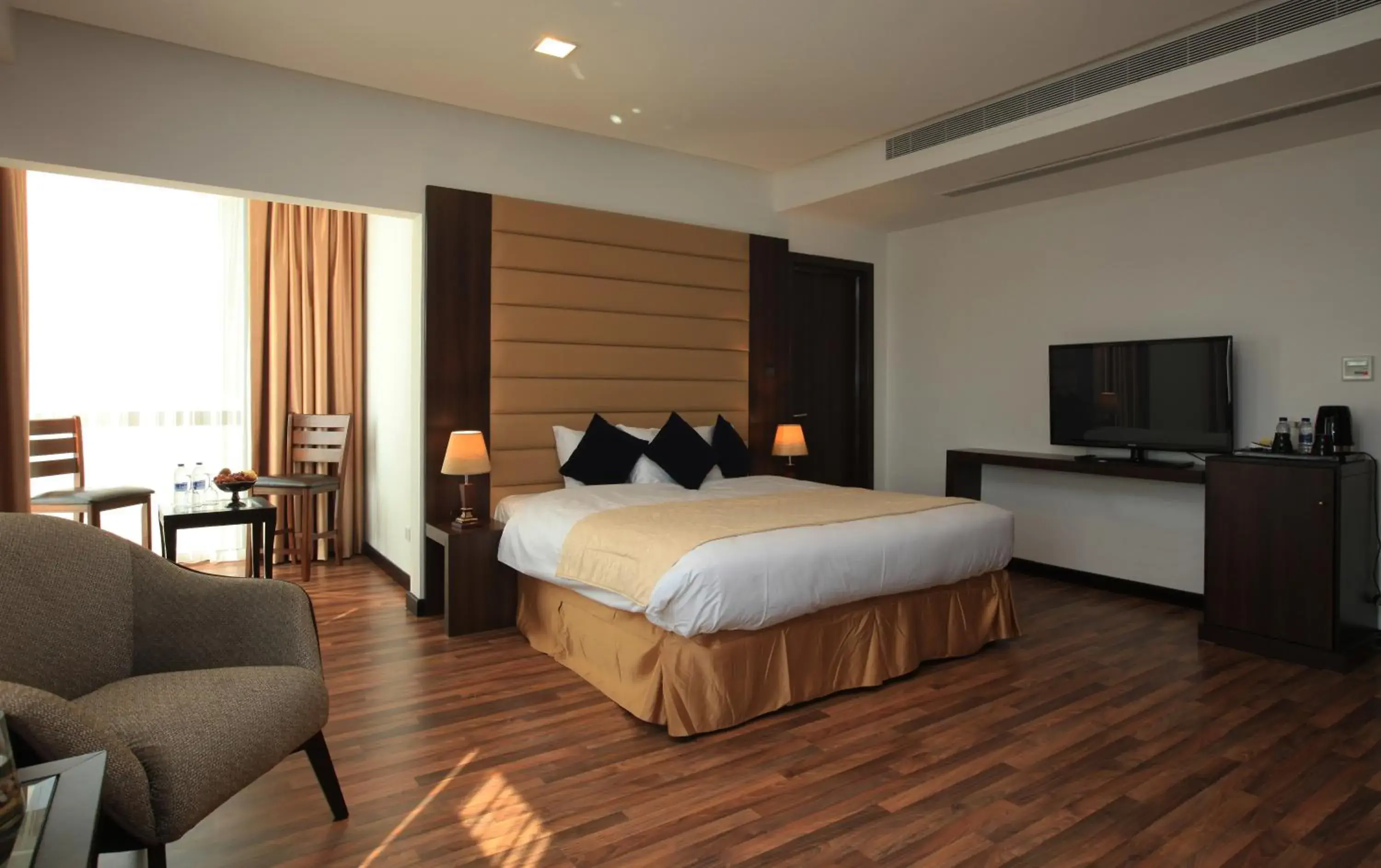 Photo of the whole room, Bed in Golden Tulip Al Khobar Suites Photo of the whole room, Bed in Golden Tulip Al Khobar Suites