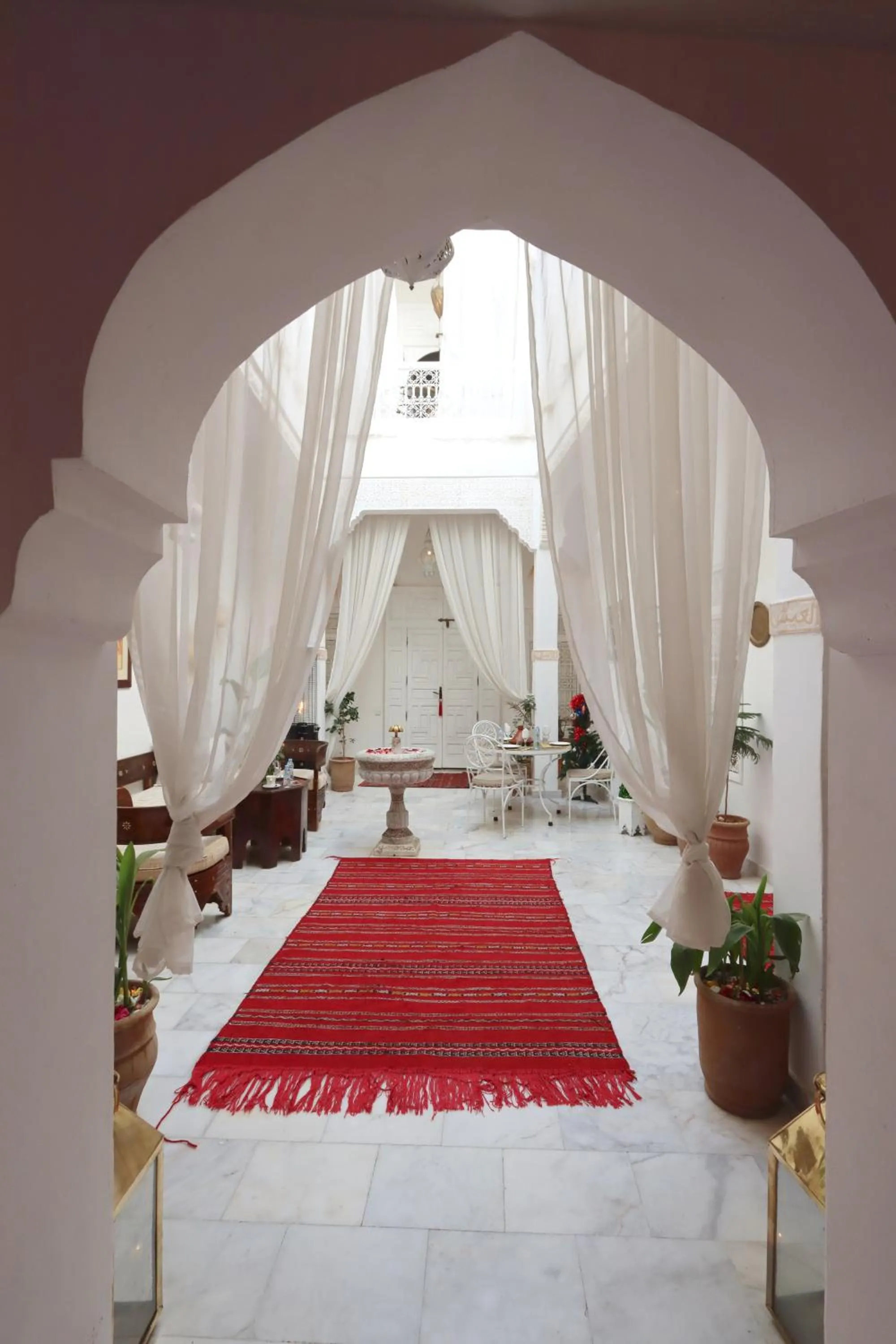 Seating area, Bed in Riad Morocco Sky