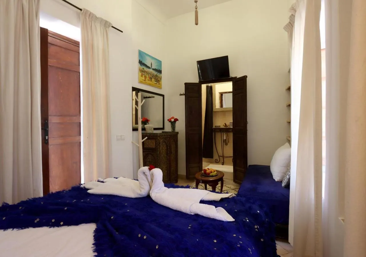 Seating area, Bed in Riad Morocco Sky